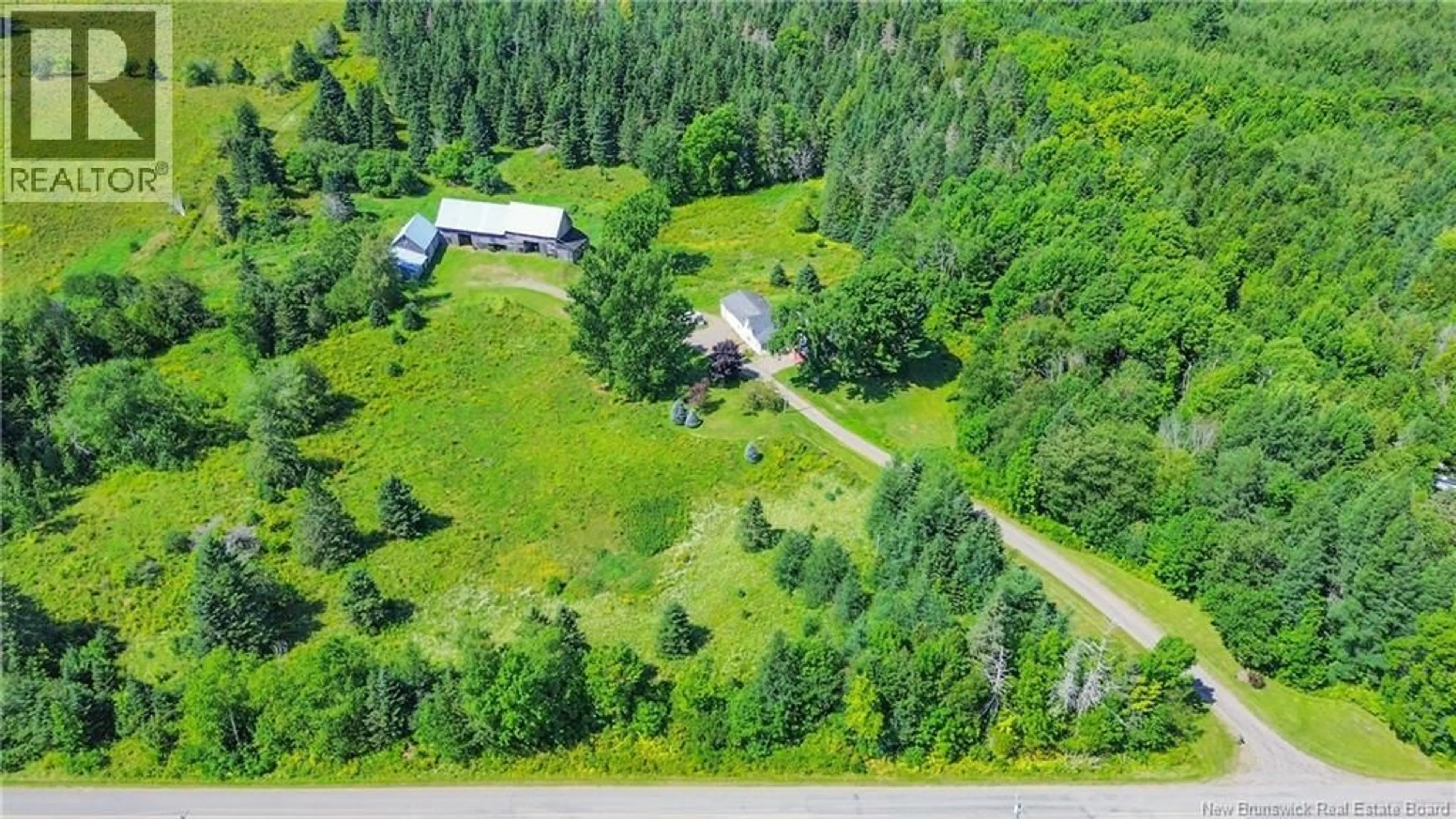 A pic from outside/outdoor area/front of a property/back of a property/a pic from drone, forest/trees view for 1466 ROUTE 122, Skiff Lake New Brunswick E6H1N8