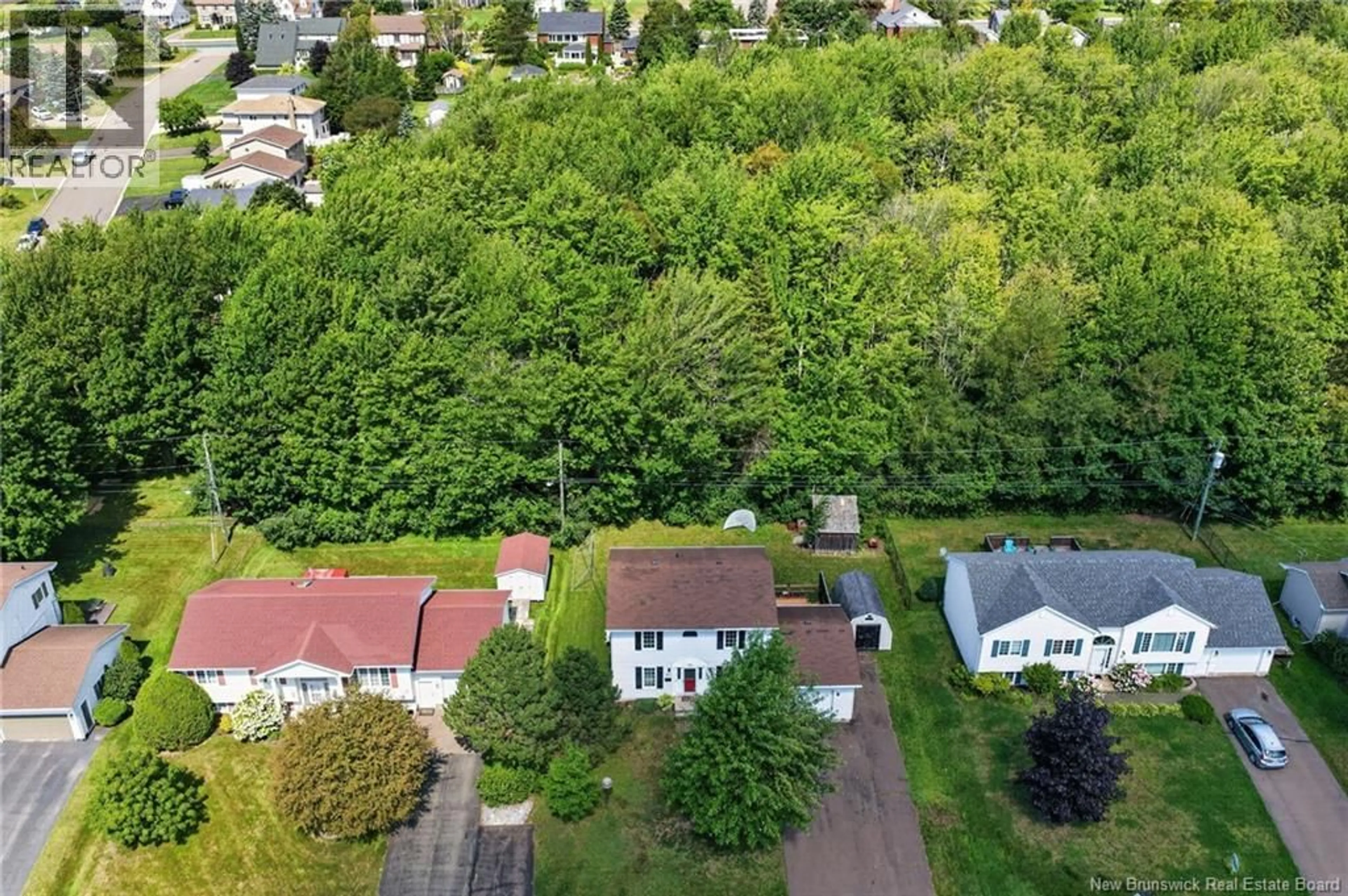 A pic from outside/outdoor area/front of a property/back of a property/a pic from drone, unknown for 97 OLD OAK CRESCENT, Moncton New Brunswick E1A6W3