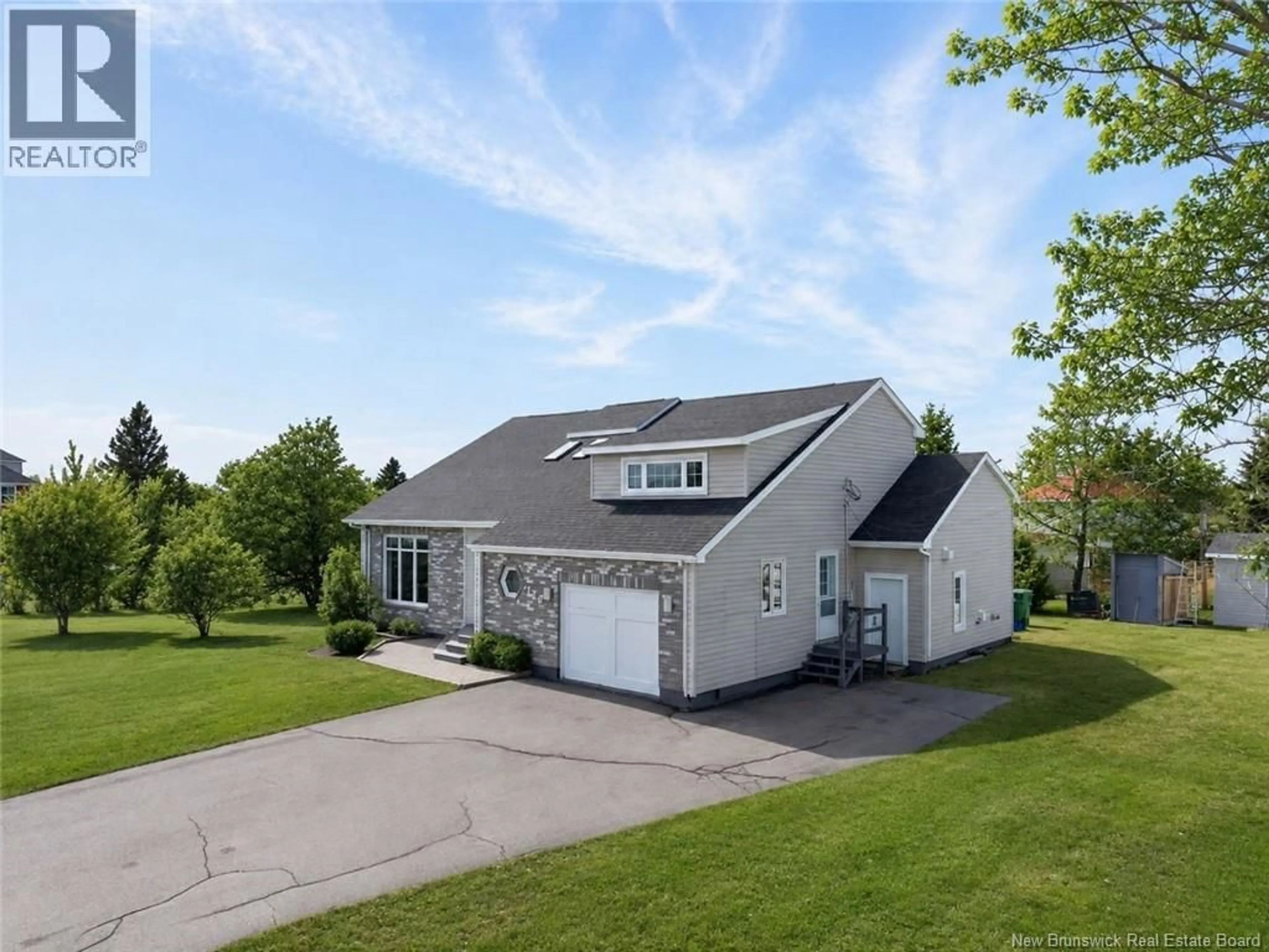 A pic from outside/outdoor area/front of a property/back of a property/a pic from drone, unknown for 116 DES CHAMPS STREET, Lamèque New Brunswick E8T1E7