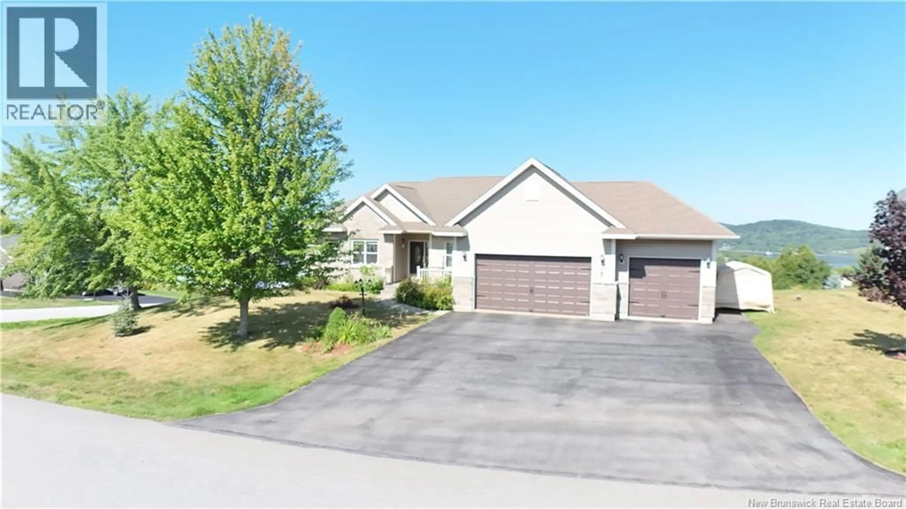 A pic from outside/outdoor area/front of a property/back of a property/a pic from drone, street for 3 PIONEER AVENUE, Quispamsis New Brunswick E2G0B1