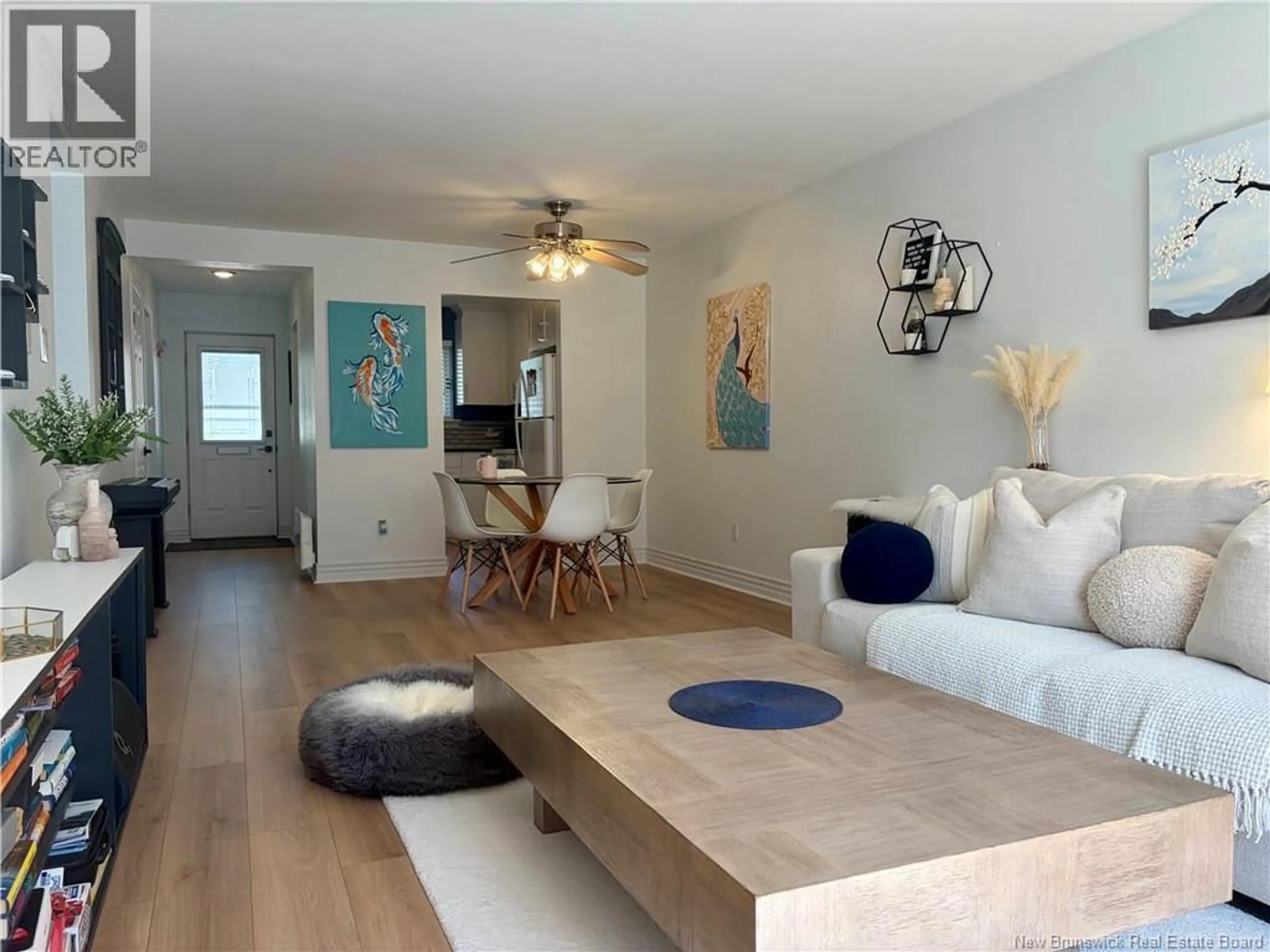 Living room with furniture, wood/laminate floor for 4 - 331 MCLAUGHLIN DRIVE, Moncton New Brunswick E1A4R3