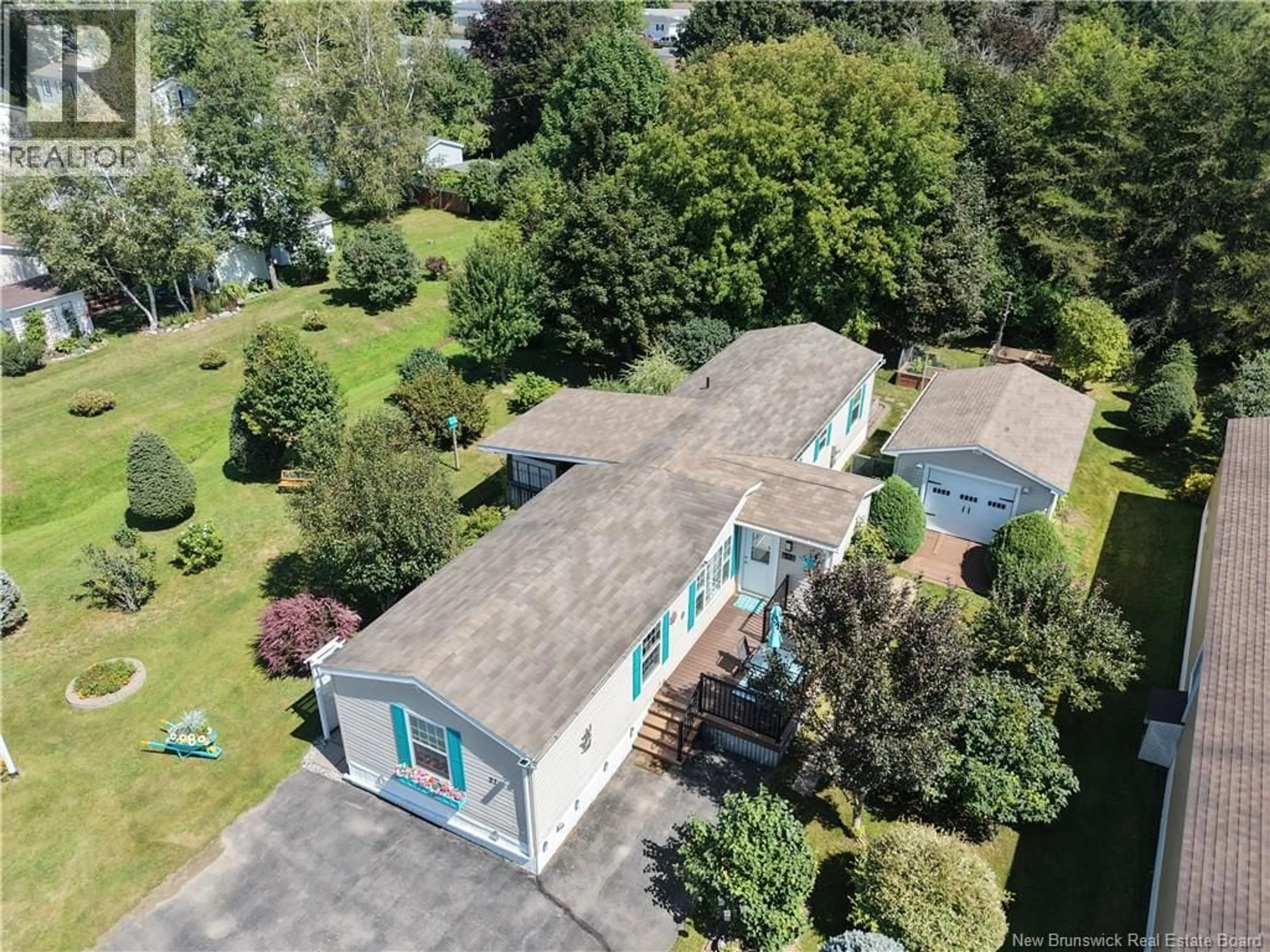 A pic from outside/outdoor area/front of a property/back of a property/a pic from drone, unknown for 27 PARK AVENUE, Sussex Corner New Brunswick E5T1R6