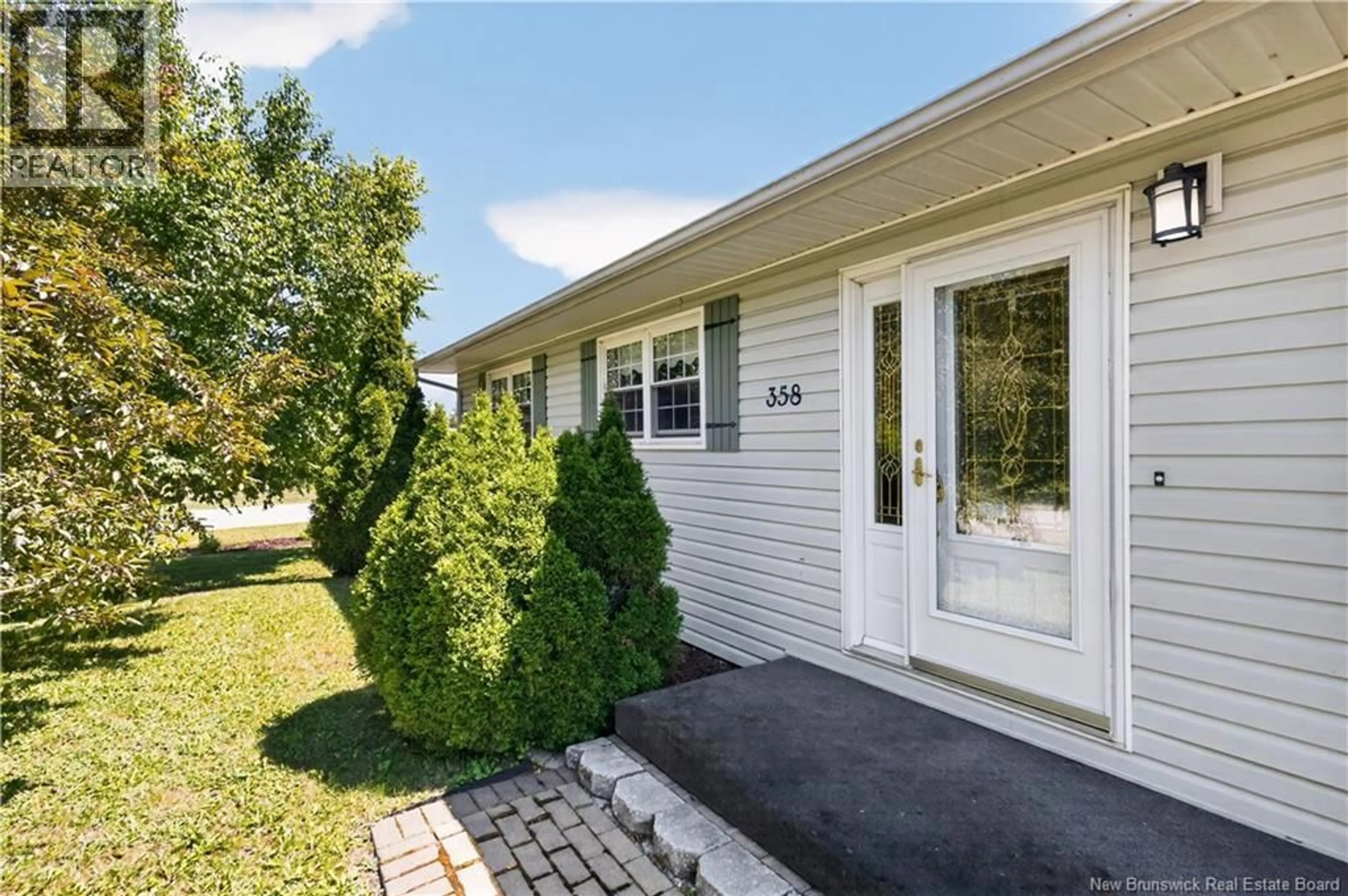 Home with vinyl exterior material, street for 358 MCKENNA AVENUE, Miramichi New Brunswick E1V1A6