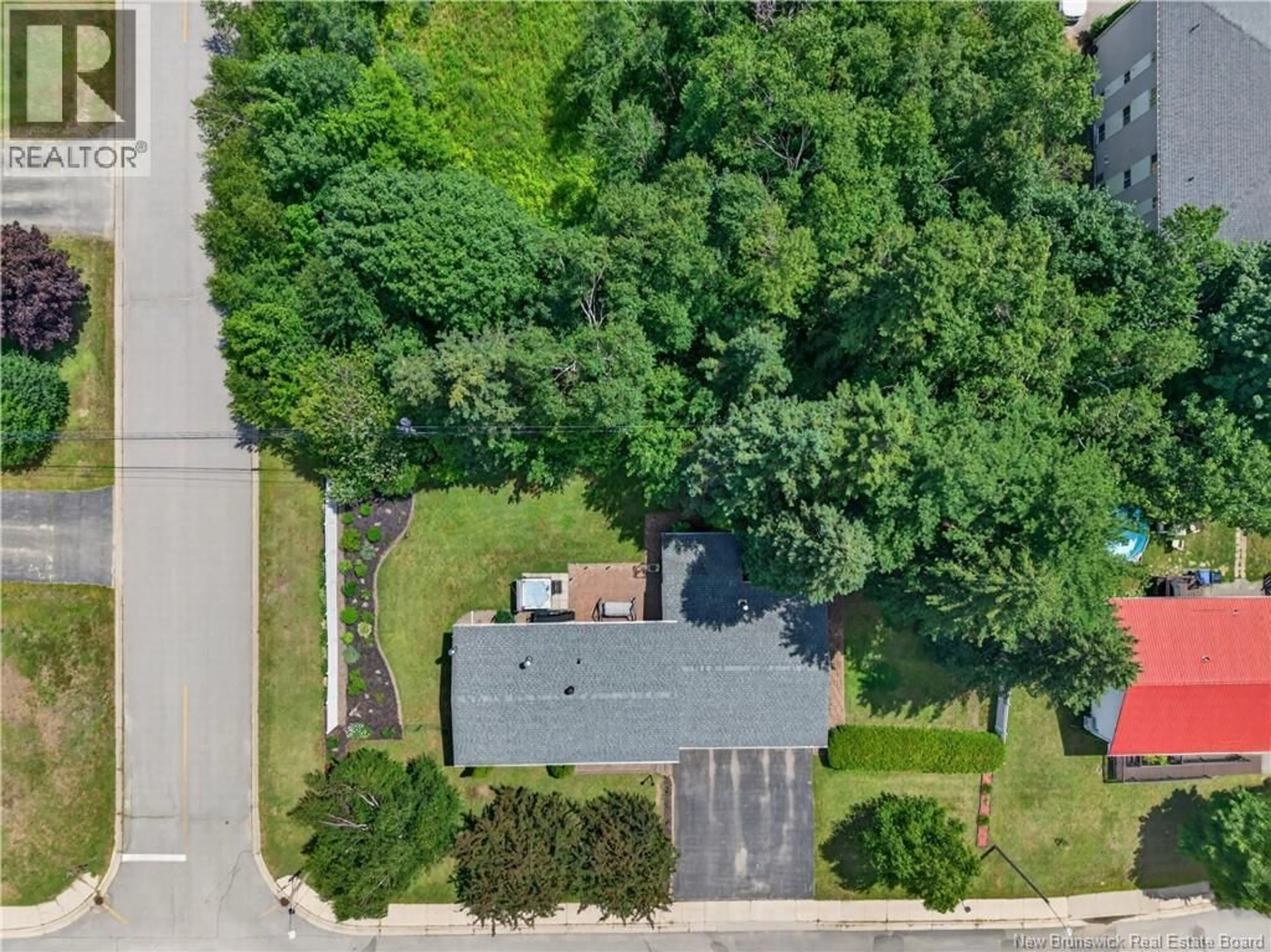 A pic from outside/outdoor area/front of a property/back of a property/a pic from drone, street for 358 MCKENNA AVENUE, Miramichi New Brunswick E1V1A6