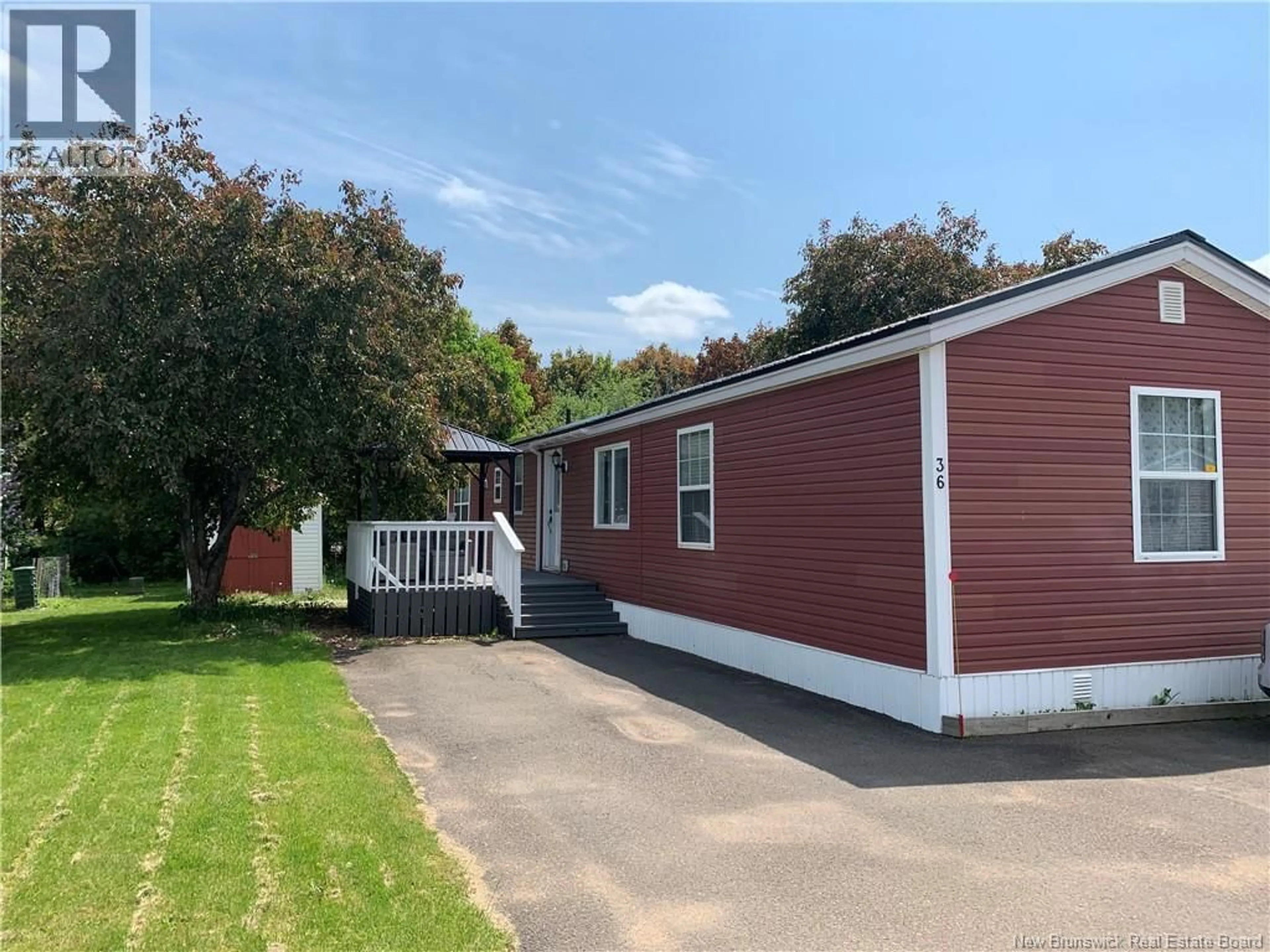 Home with vinyl exterior material, street for 36 FIRST STREET, Sussex Corner New Brunswick E4E5J3