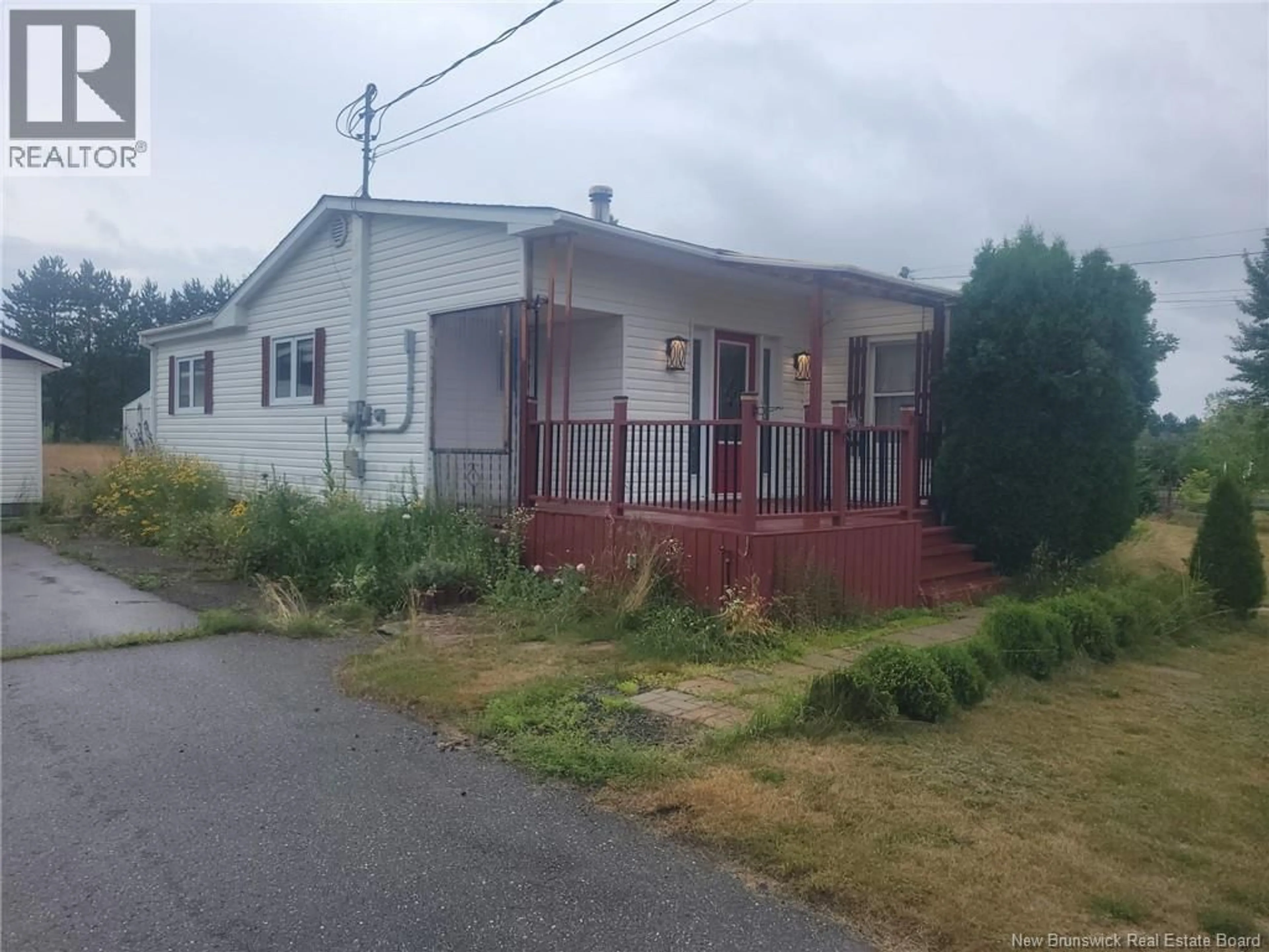 Home with vinyl exterior material, street for 197 PRINCIPAL, Neguac New Brunswick E9G1R4