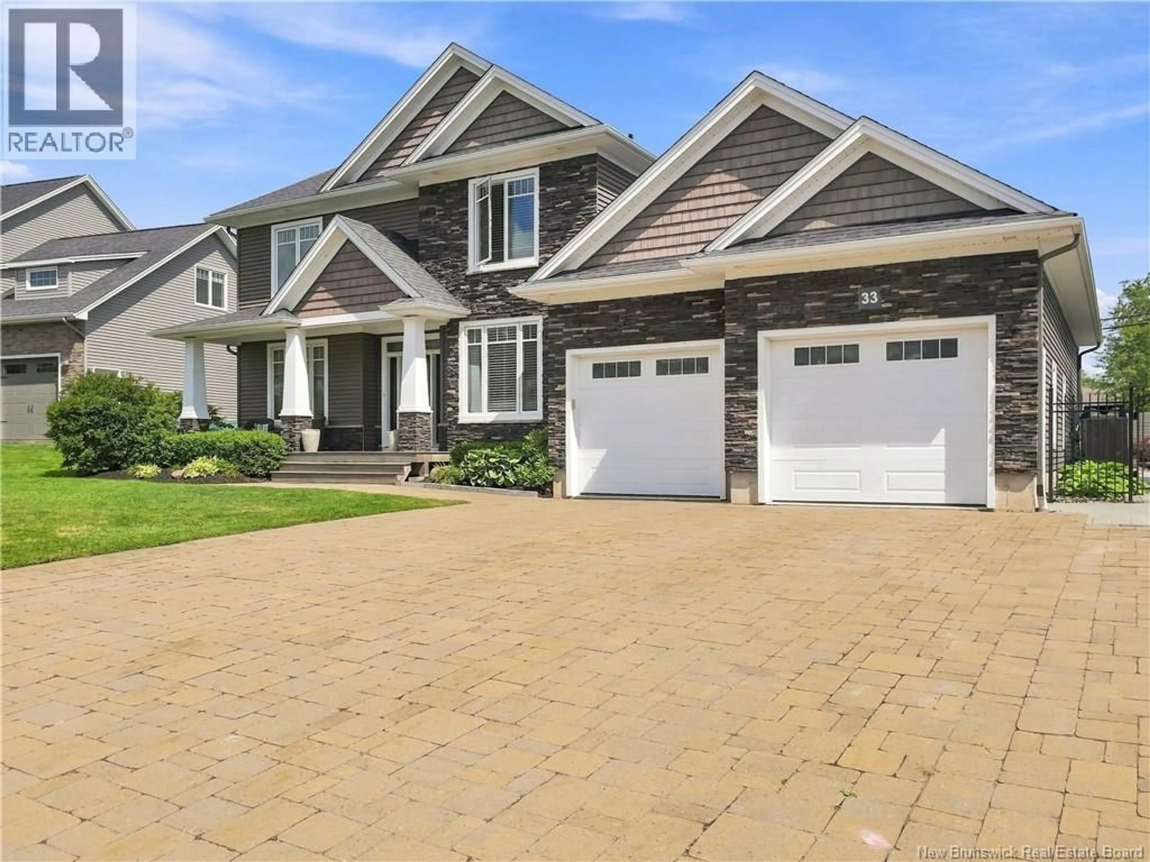 Home with brick exterior material, street for 33 ANNFIELD COURT, Moncton New Brunswick E1G0N9