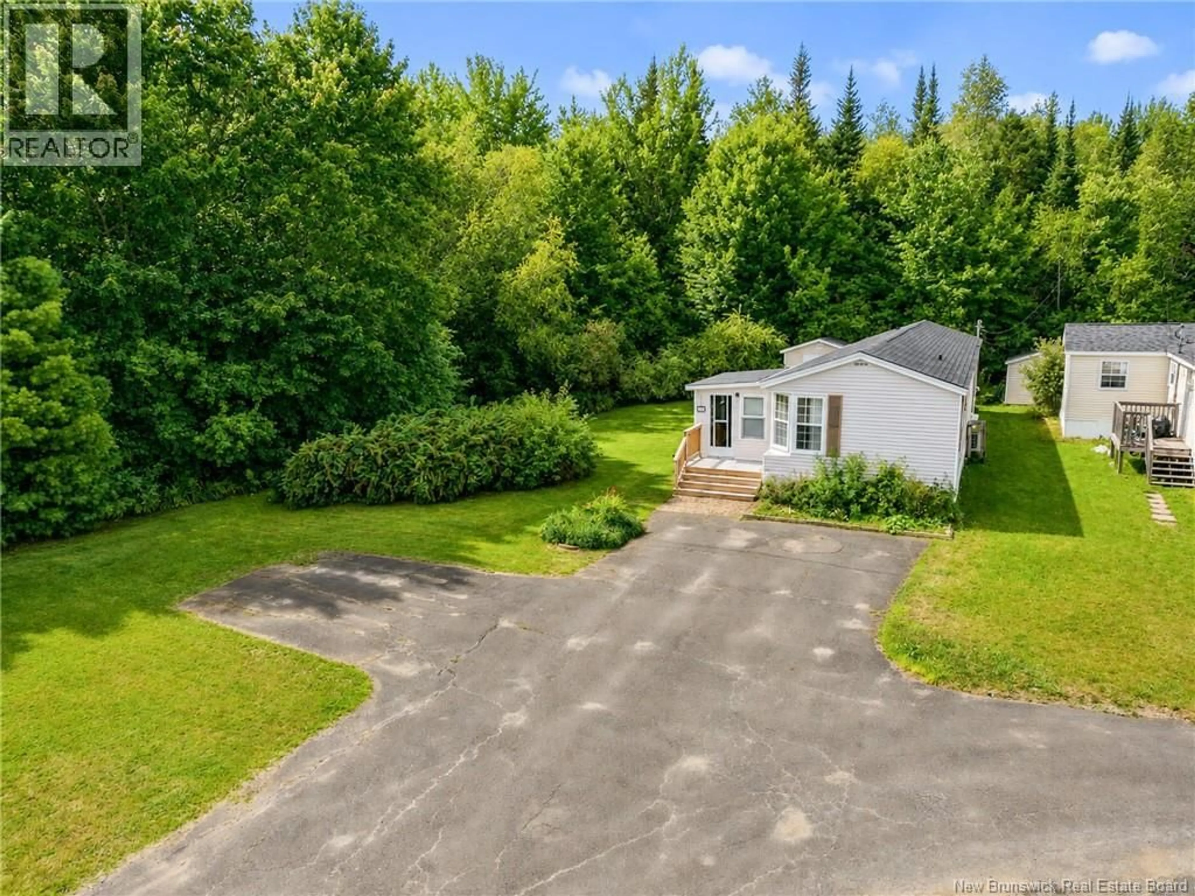 A pic from outside/outdoor area/front of a property/back of a property/a pic from drone, unknown for 153 MOORE STREET, Fredericton New Brunswick E3B8L8