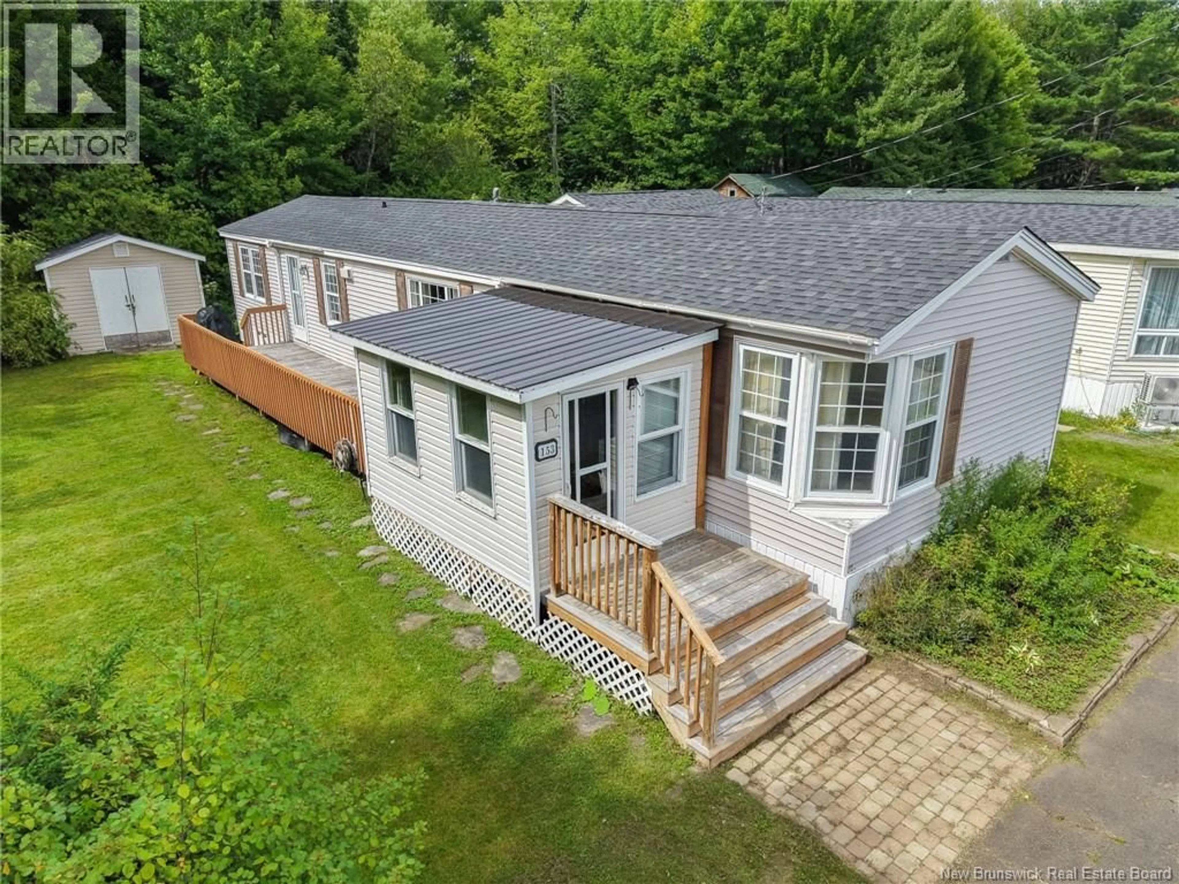 A pic from outside/outdoor area/front of a property/back of a property/a pic from drone, unknown for 153 MOORE STREET, Fredericton New Brunswick E3B8L8