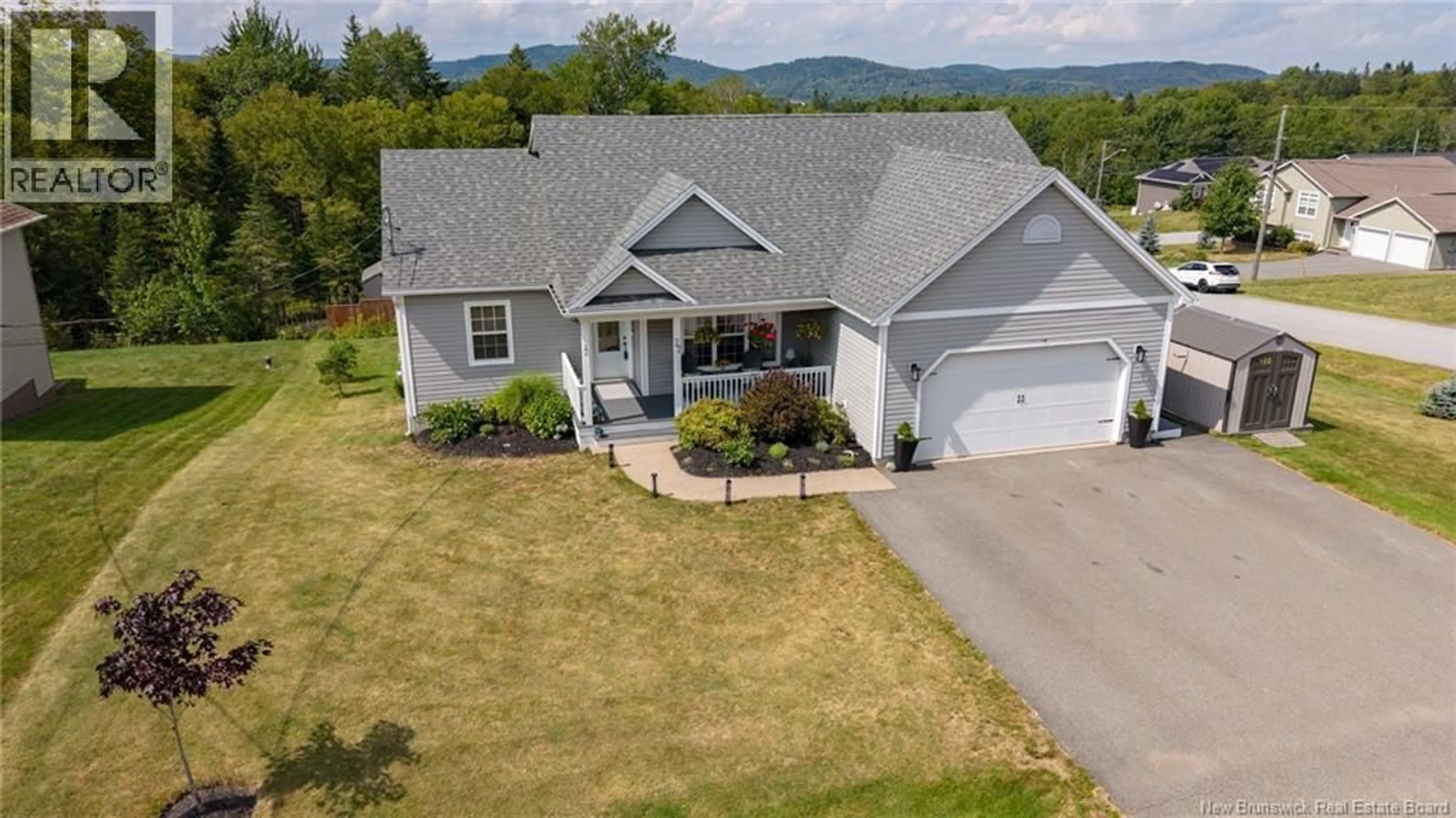 A pic from outside/outdoor area/front of a property/back of a property/a pic from drone, unknown for 27 RUNNYMEDE DRIVE, Quispamsis New Brunswick E2G0G2