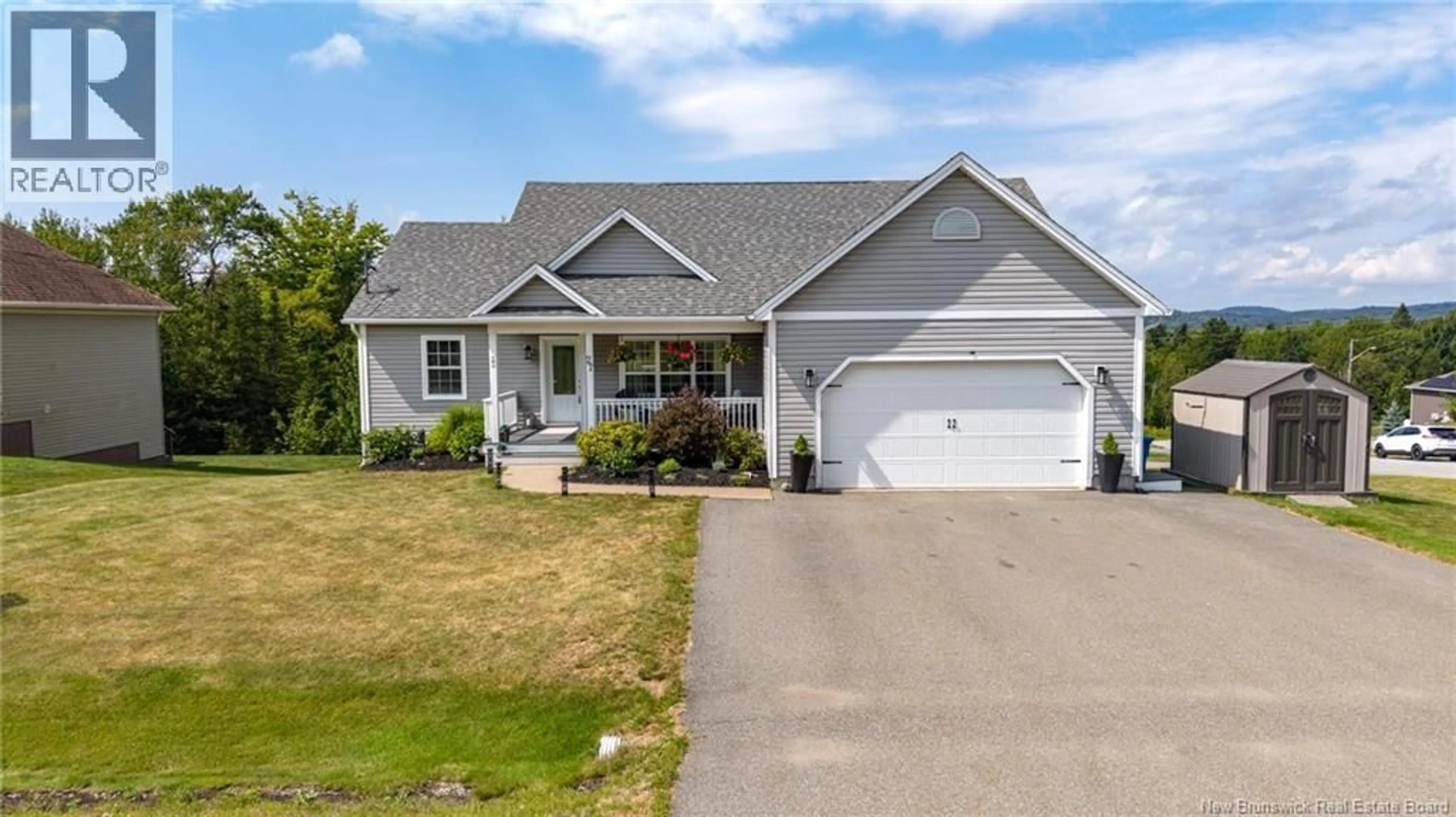 Home with vinyl exterior material, street for 27 RUNNYMEDE DRIVE, Quispamsis New Brunswick E2G0G2