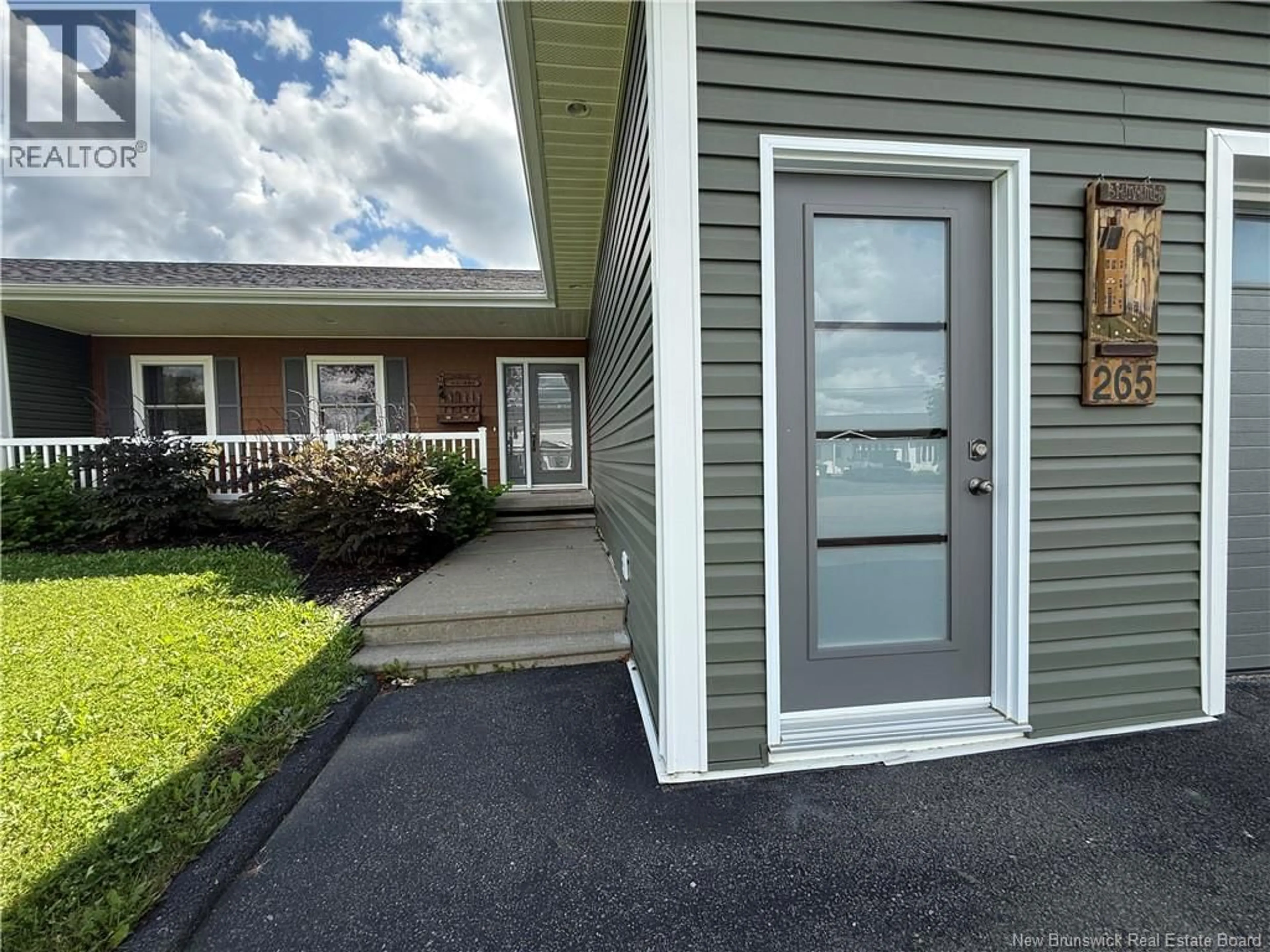 Home with vinyl exterior material, street for 265 CASWELL STREET, Grand-Sault/Grand Falls New Brunswick E3Z1A7