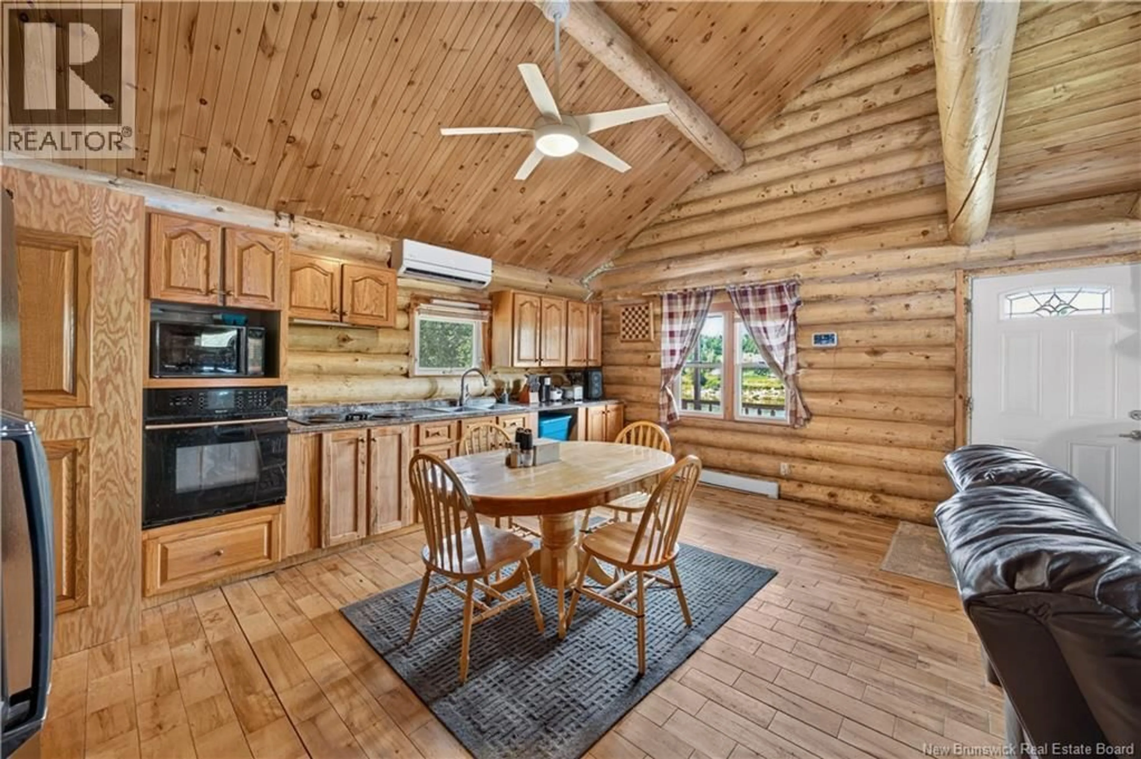 Open concept kitchen, wood/laminate floor for 1129 BROPHY ROAD, Arbeau Settlement New Brunswick E9B1P8