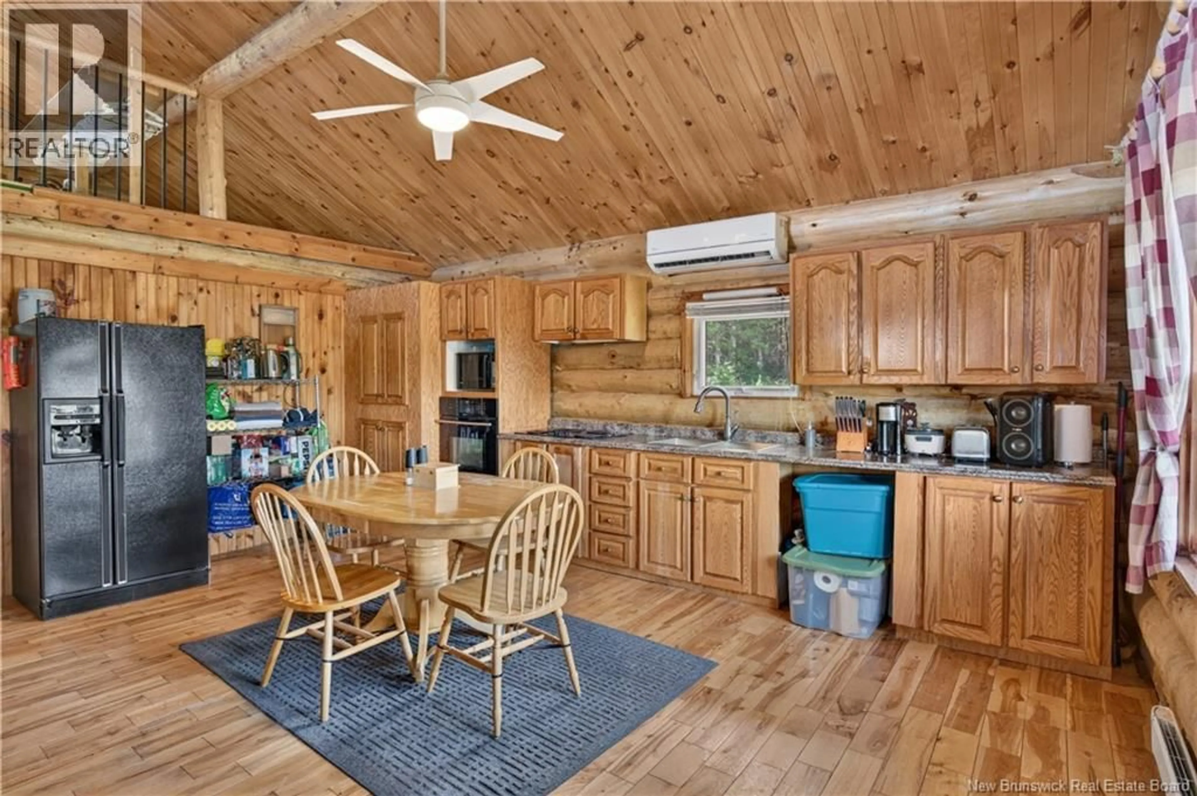 Open concept kitchen, wood/laminate floor for 1129 BROPHY ROAD, Arbeau Settlement New Brunswick E9B1P8
