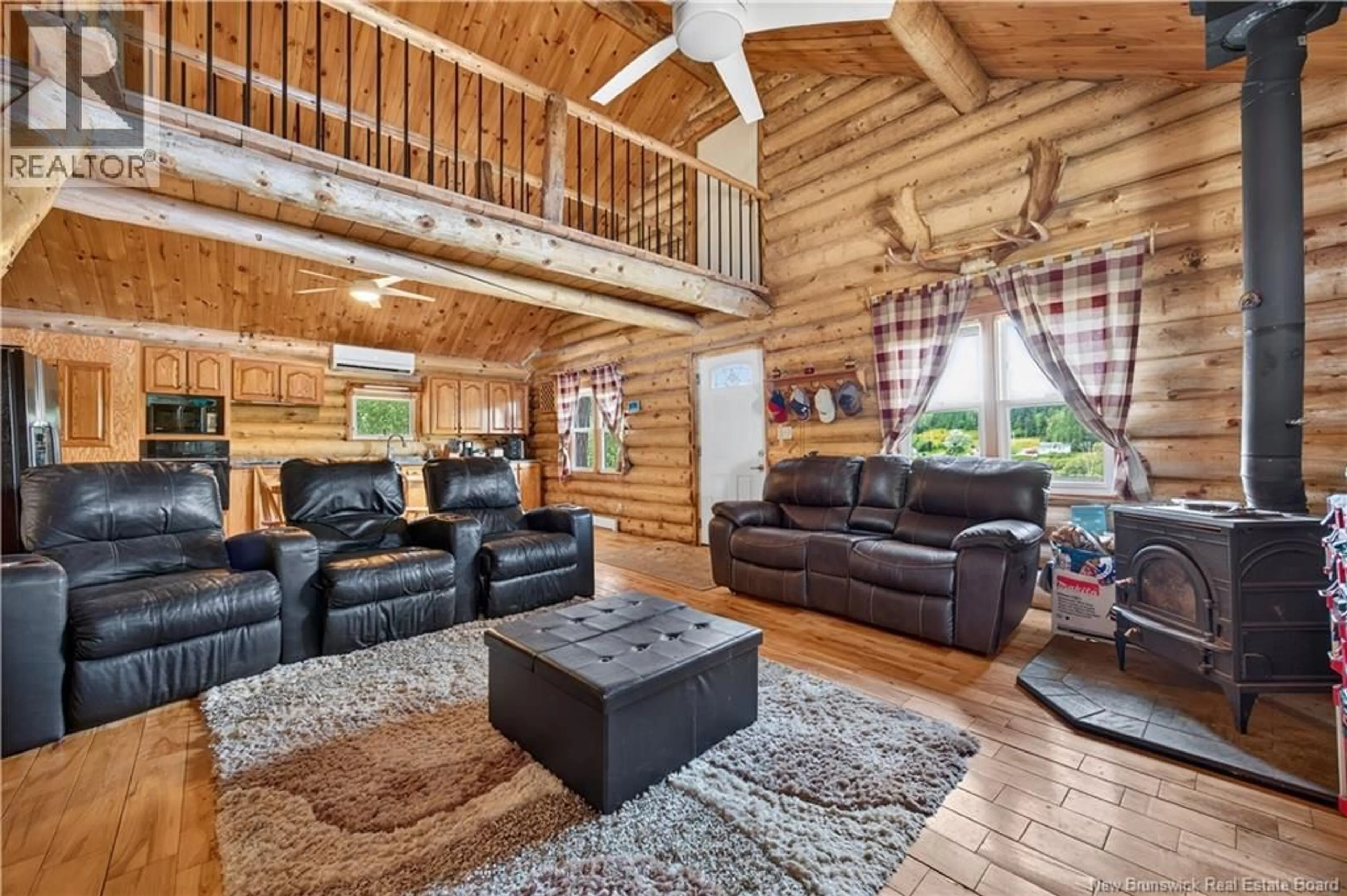 Living room with furniture, wood/laminate floor for 1129 BROPHY ROAD, Arbeau Settlement New Brunswick E9B1P8