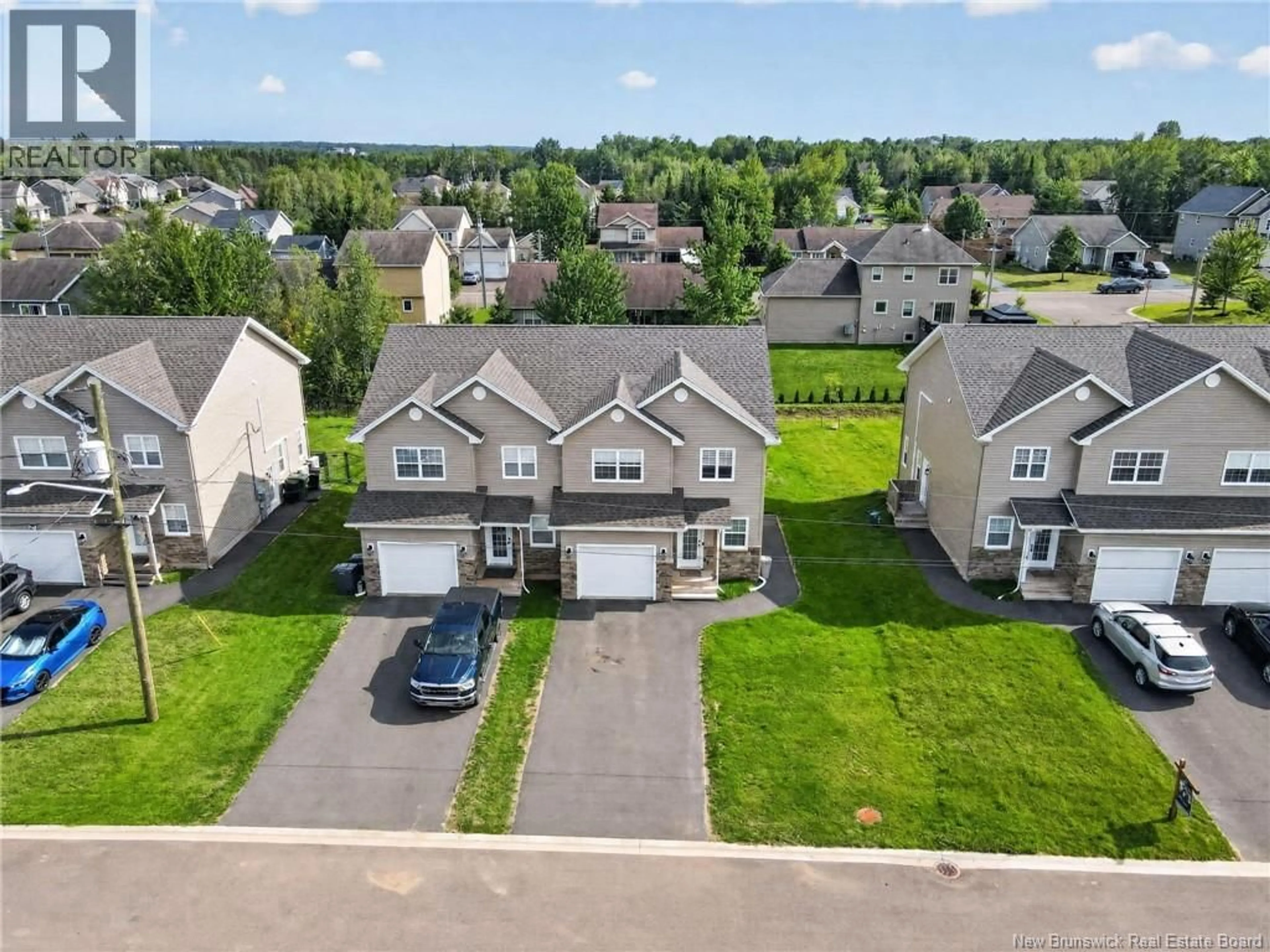 A pic from outside/outdoor area/front of a property/back of a property/a pic from drone, street for 14 ROCHEFORT STREET, Dieppe New Brunswick E1A6S4