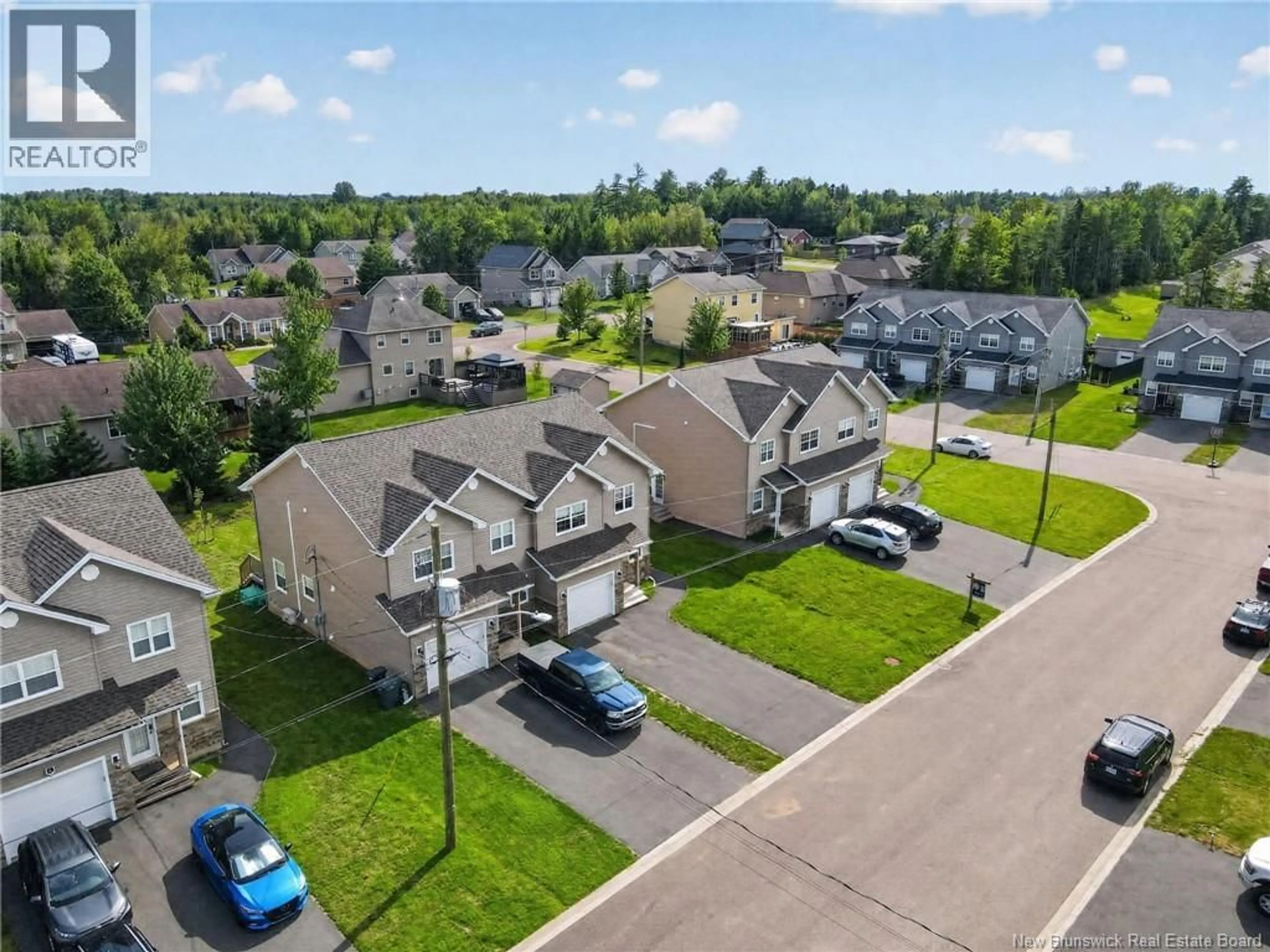 A pic from outside/outdoor area/front of a property/back of a property/a pic from drone, street for 14 ROCHEFORT STREET, Dieppe New Brunswick E1A6S4