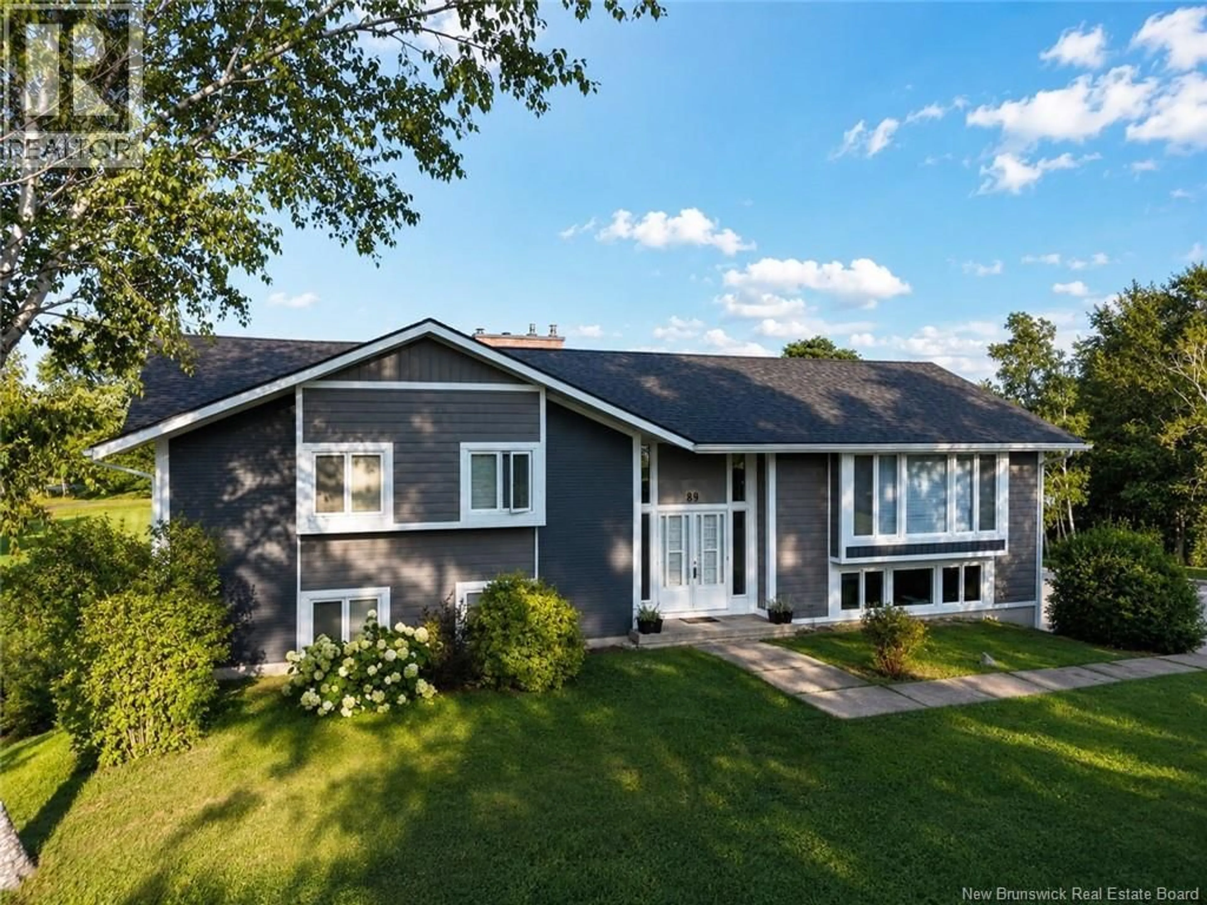 Home with vinyl exterior material, street for 89 MAIN STREET, Rexton New Brunswick E4W2A1