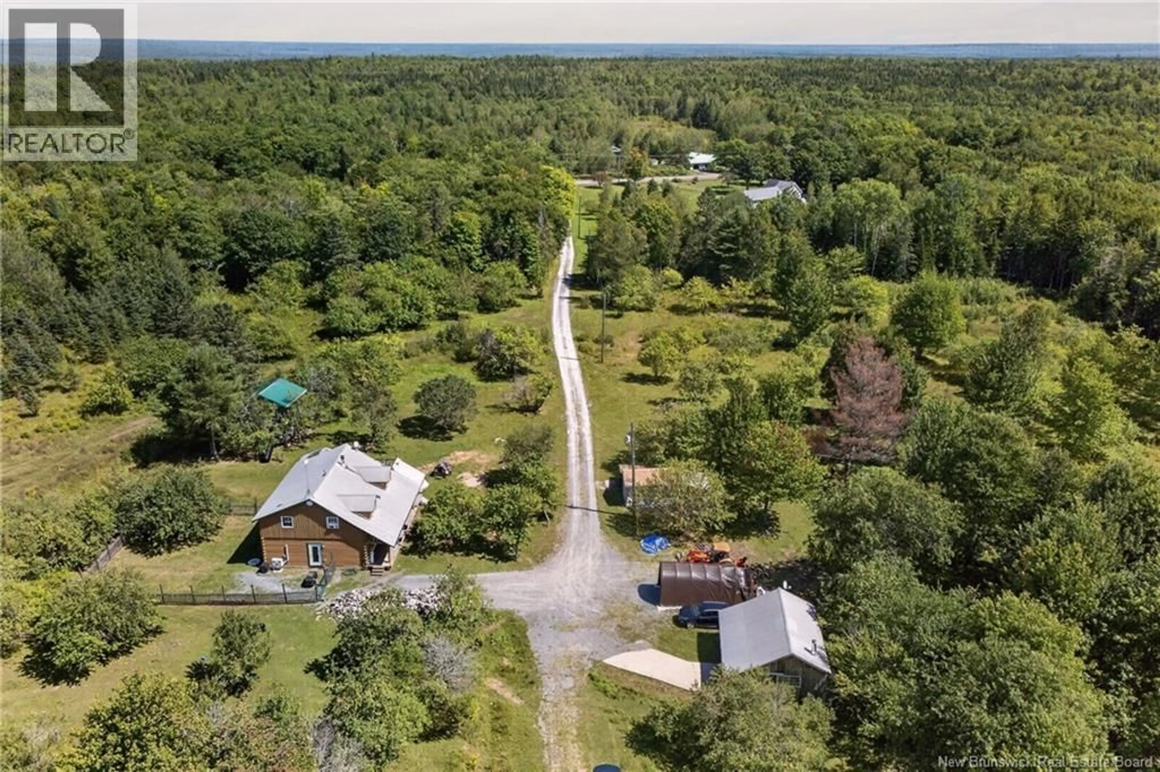 A pic from outside/outdoor area/front of a property/back of a property/a pic from drone, forest/trees view for 240 ENGLISH SETTLEMENT ROAD, English Settlement New Brunswick E6B2E8