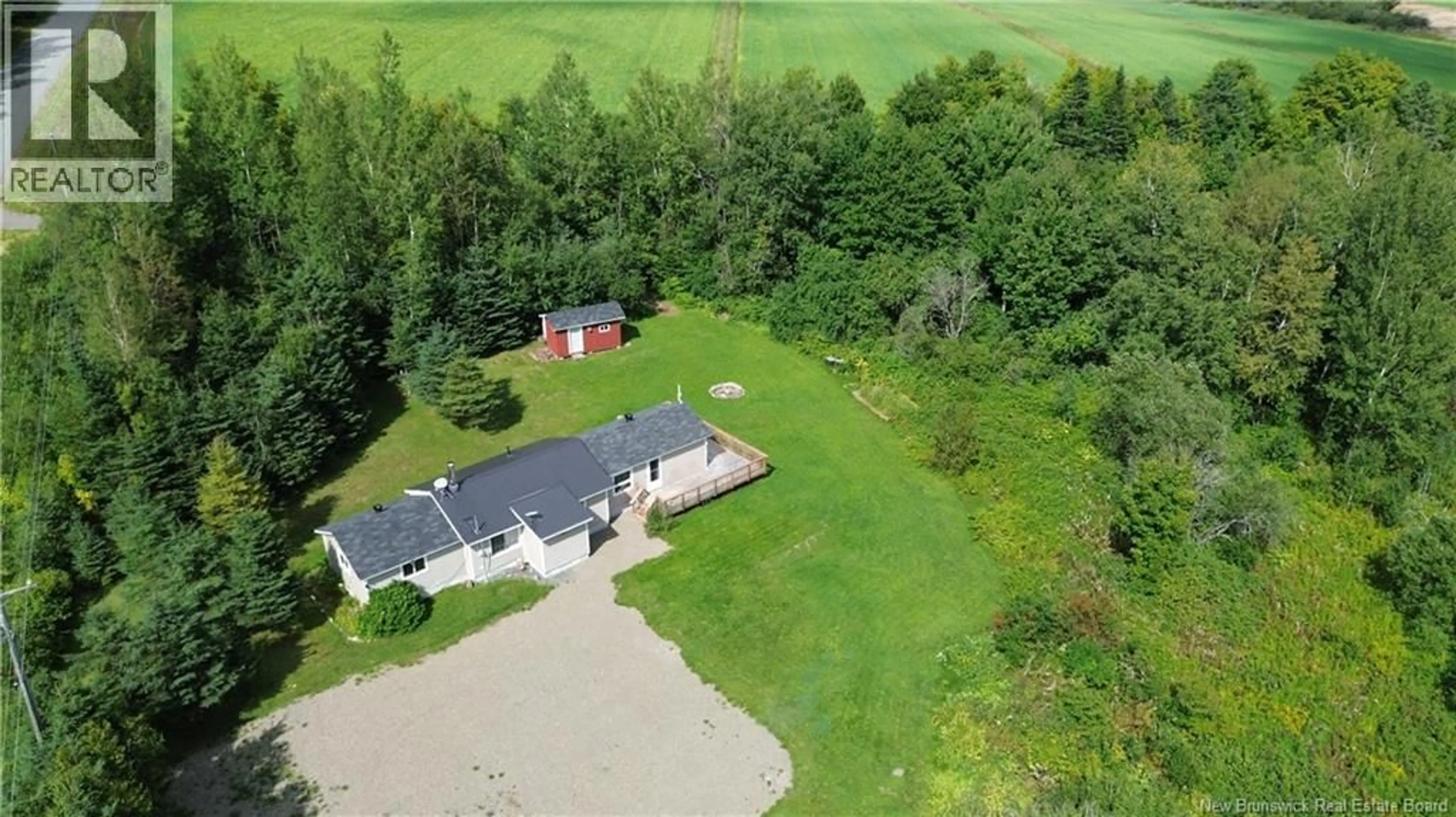 A pic from outside/outdoor area/front of a property/back of a property/a pic from drone, unknown for 65 KNOWLESVILLE ROAD, Knowlesville New Brunswick E7L1M8