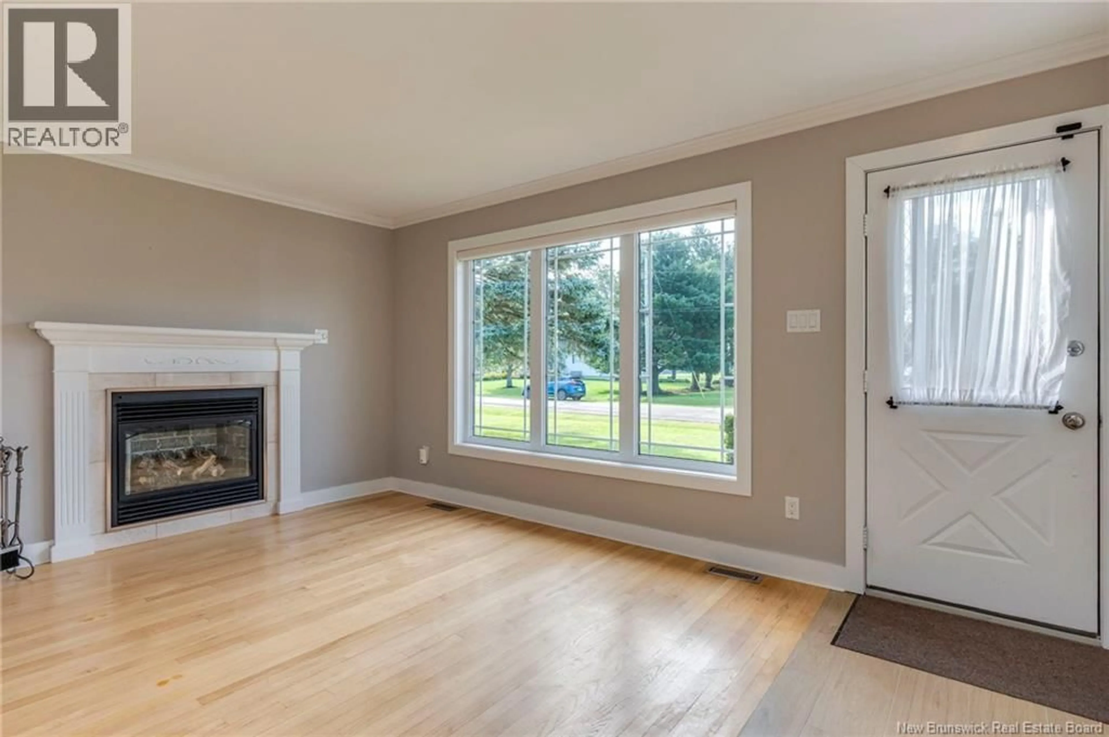 Living room with furniture, wood/laminate floor for 55 HARBOUR VIEW DRIVE, Scoudouc Road New Brunswick E4P3L6