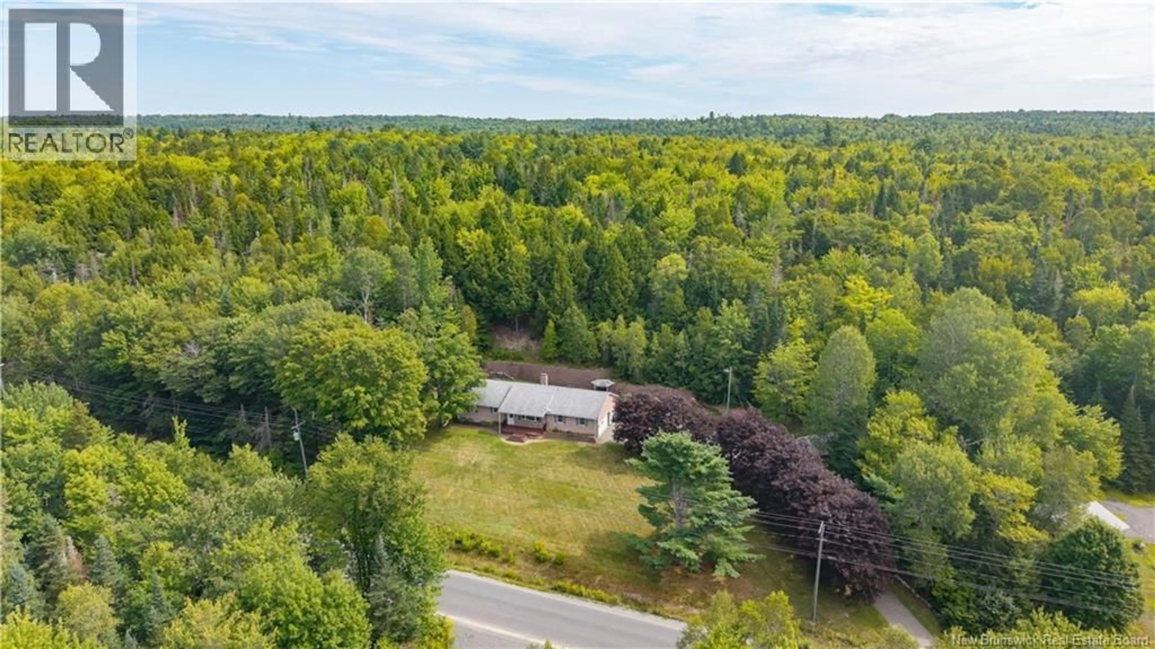 A pic from outside/outdoor area/front of a property/back of a property/a pic from drone, forest/trees view for 488 ROUTE 750, Valley Road New Brunswick E3L4V1