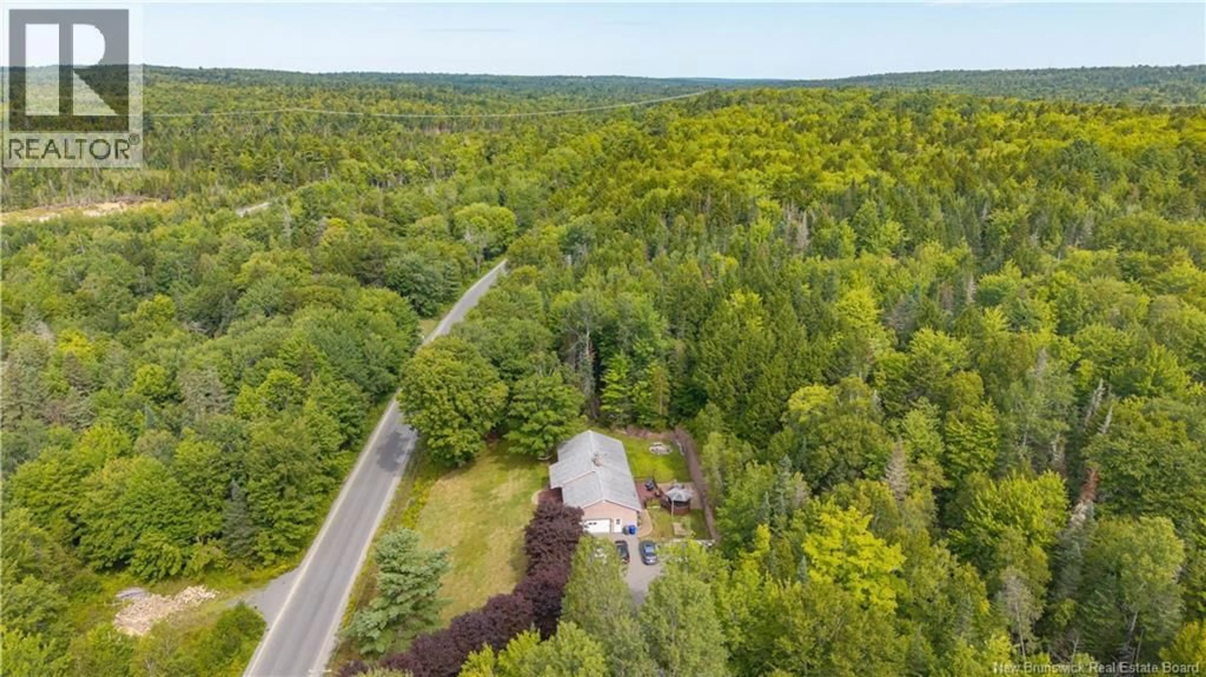 A pic from outside/outdoor area/front of a property/back of a property/a pic from drone, forest/trees view for 488 ROUTE 750, Valley Road New Brunswick E3L4V1