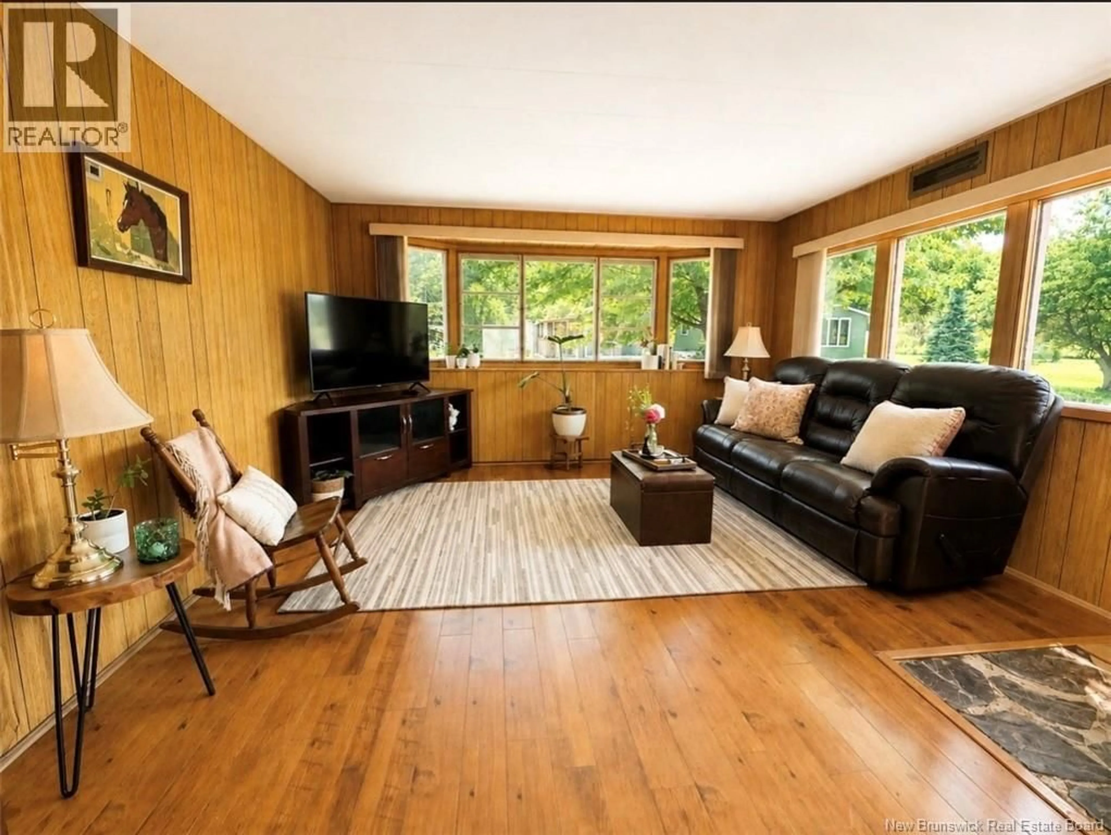 Living room with furniture, wood/laminate floor for 144 CONIFER, Saint John New Brunswick E2K4T2