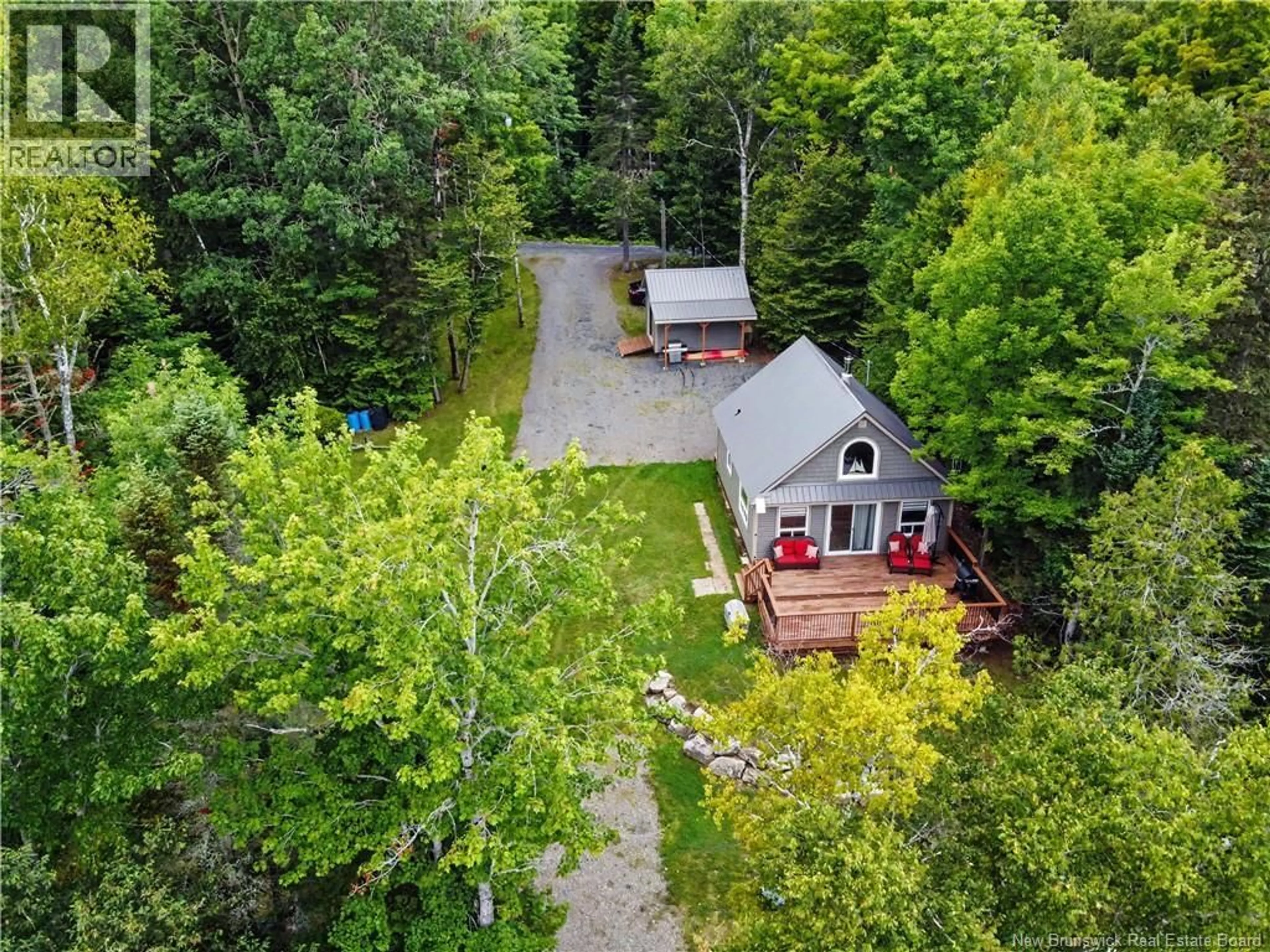 A pic from outside/outdoor area/front of a property/back of a property/a pic from drone, unknown for 104 WATSON LANE, First Eel Lake New Brunswick E7N3B5