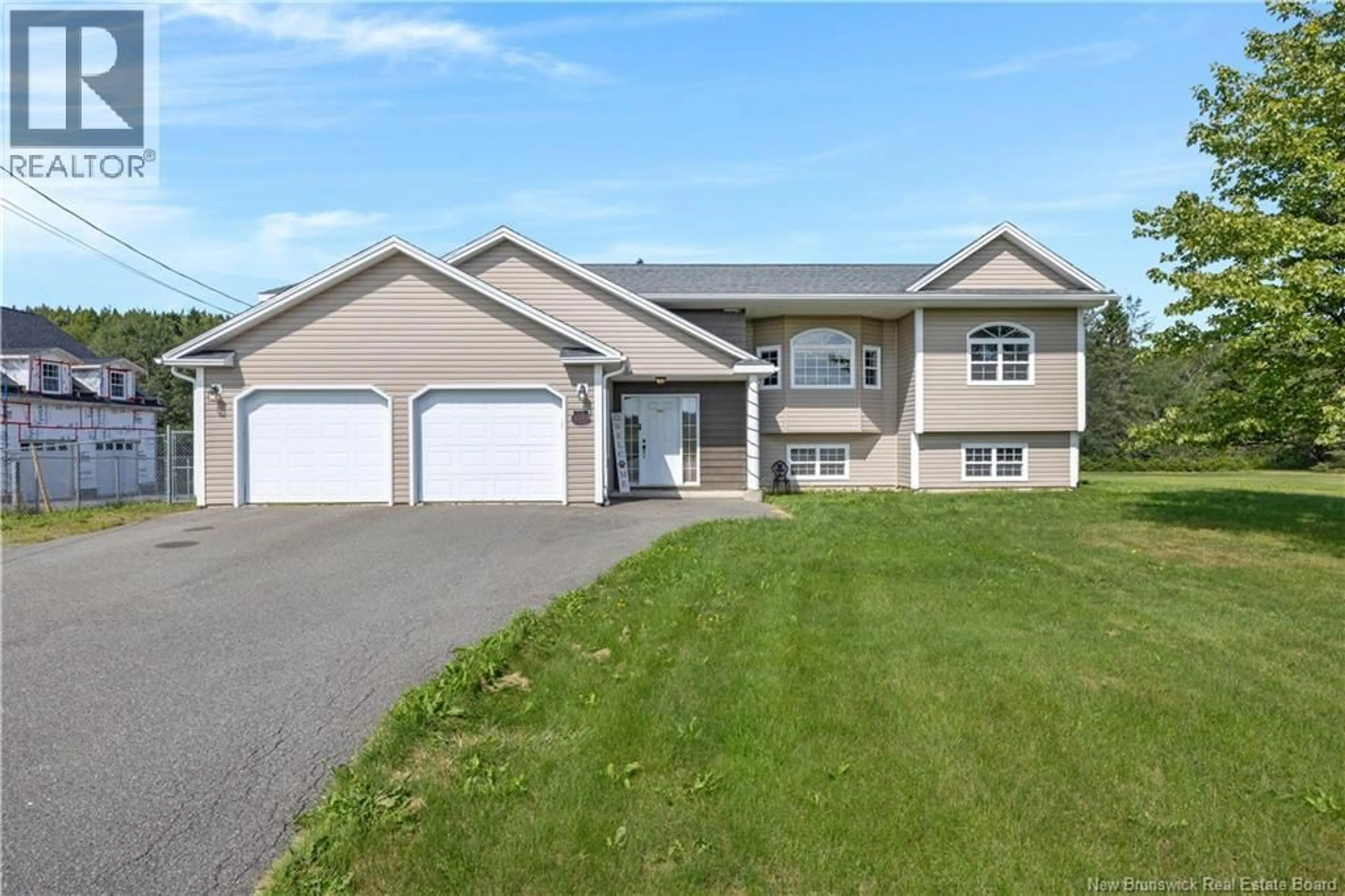 Home with vinyl exterior material, street for 634 ROUTE 825, Garnett Settlement New Brunswick E2S1T2