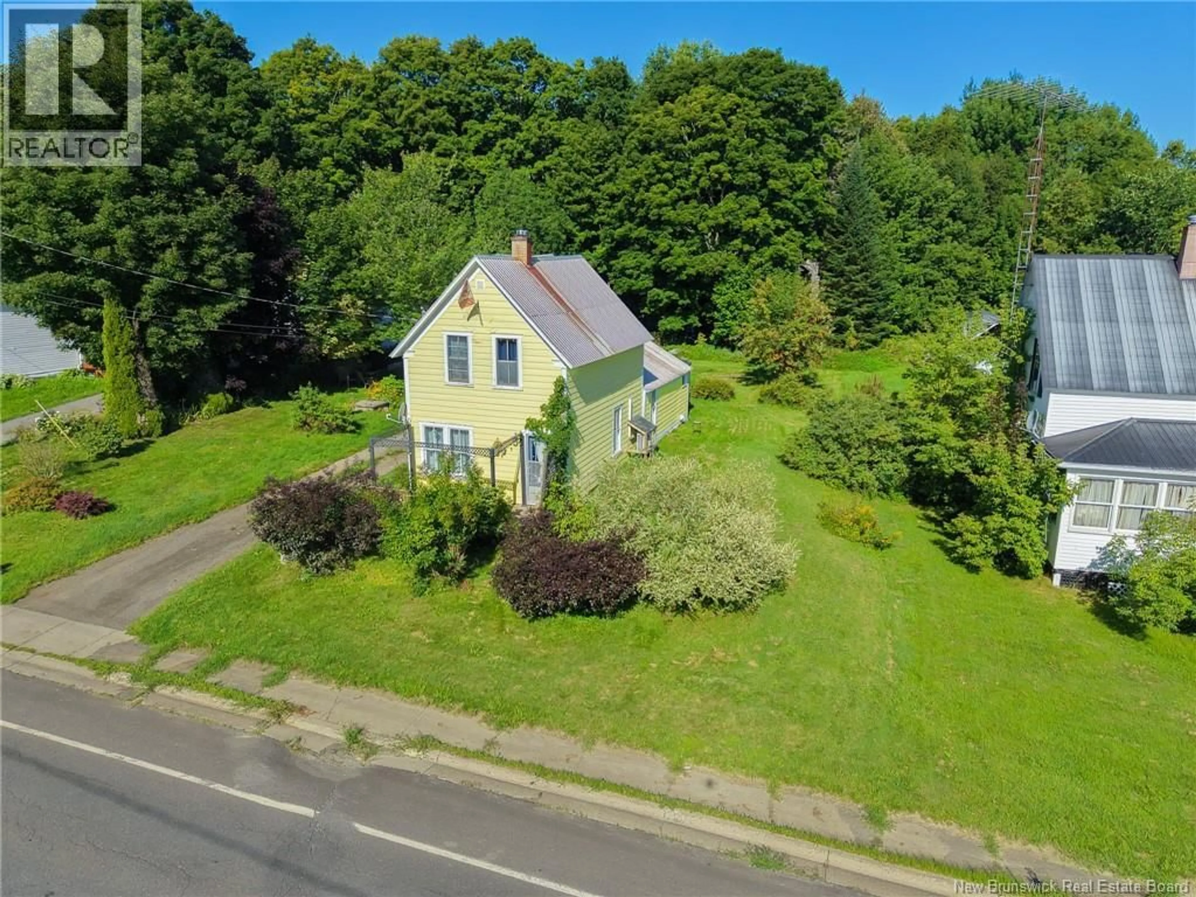 A pic from outside/outdoor area/front of a property/back of a property/a pic from drone, street for 176 MAIN STREET, Canterbury New Brunswick E6H1K9