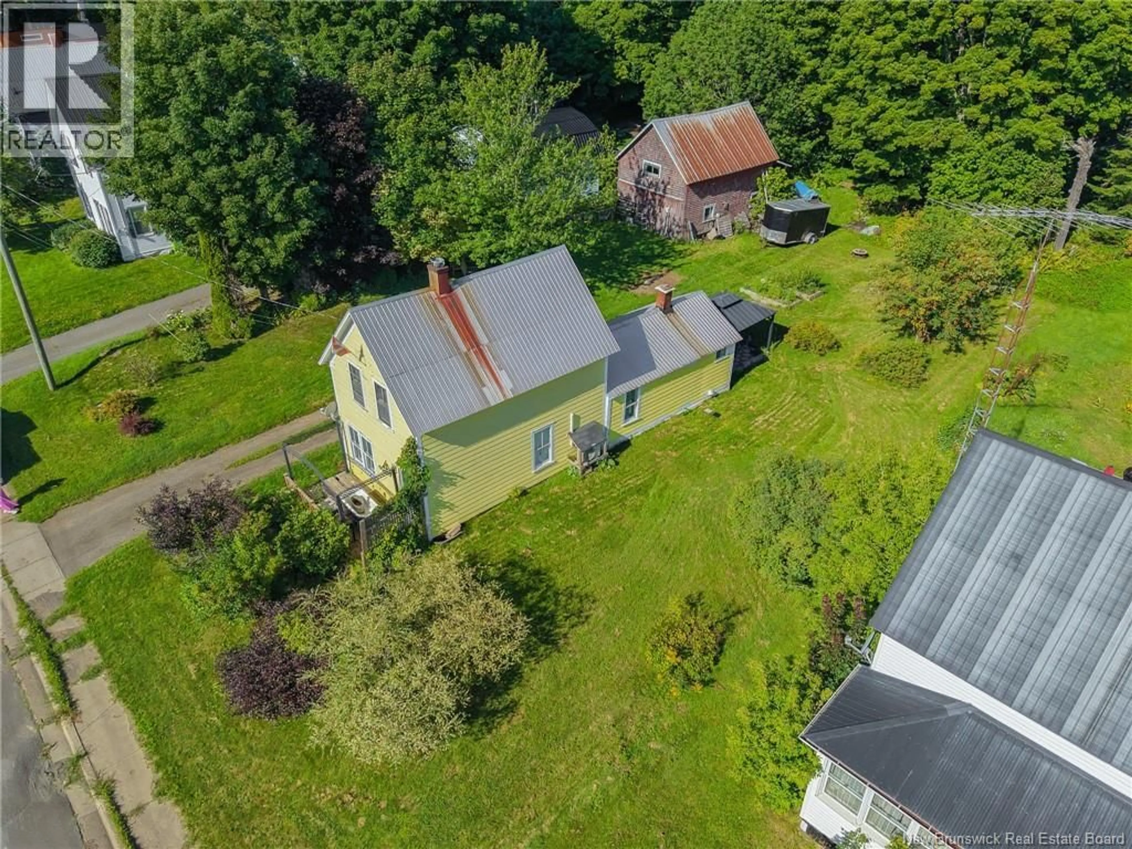 A pic from outside/outdoor area/front of a property/back of a property/a pic from drone, street for 176 MAIN STREET, Canterbury New Brunswick E6H1K9