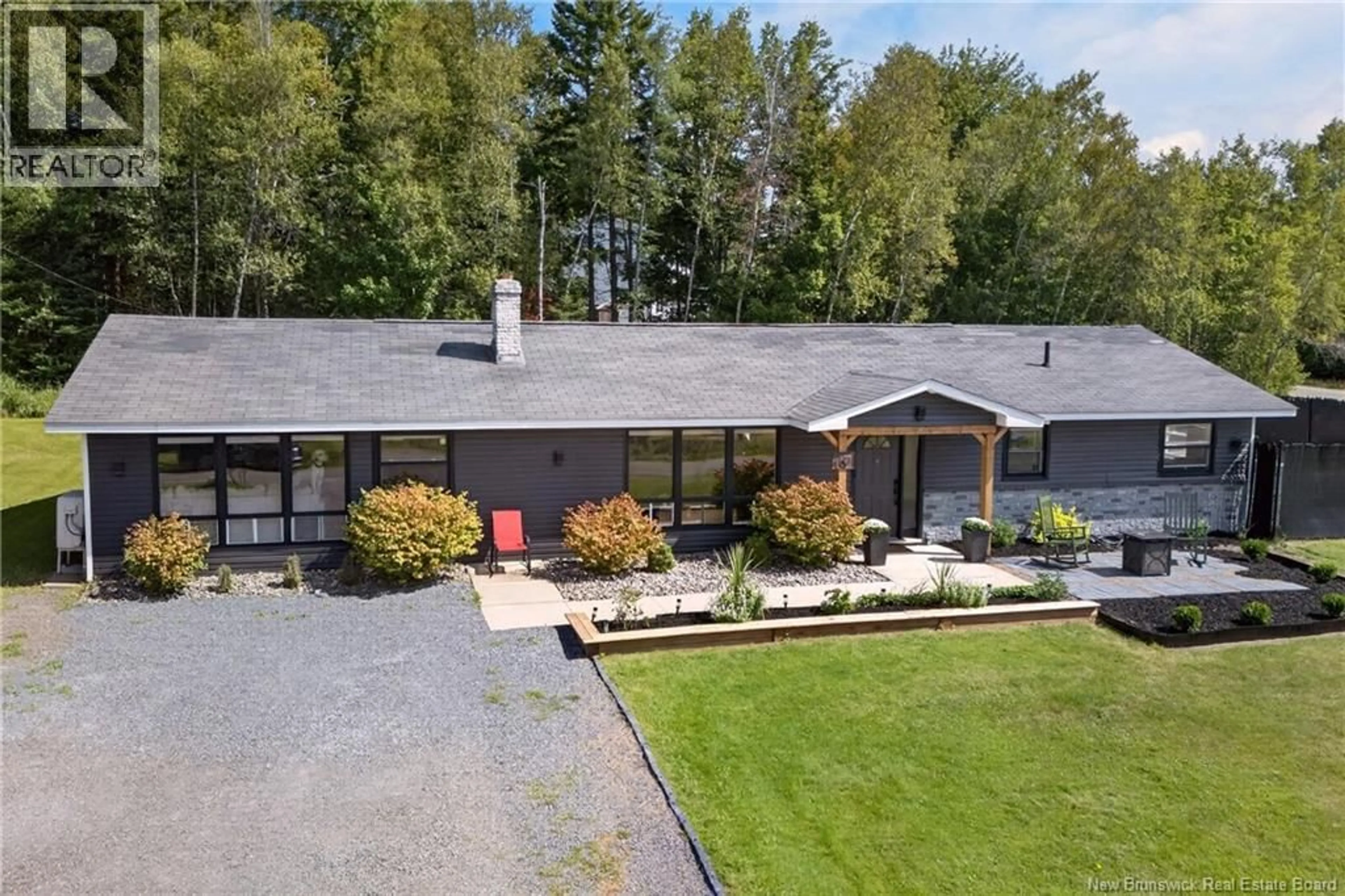 A pic from outside/outdoor area/front of a property/back of a property/a pic from drone, unknown for 10 SOMMERSET LANE, Douglas New Brunswick E6G8B1