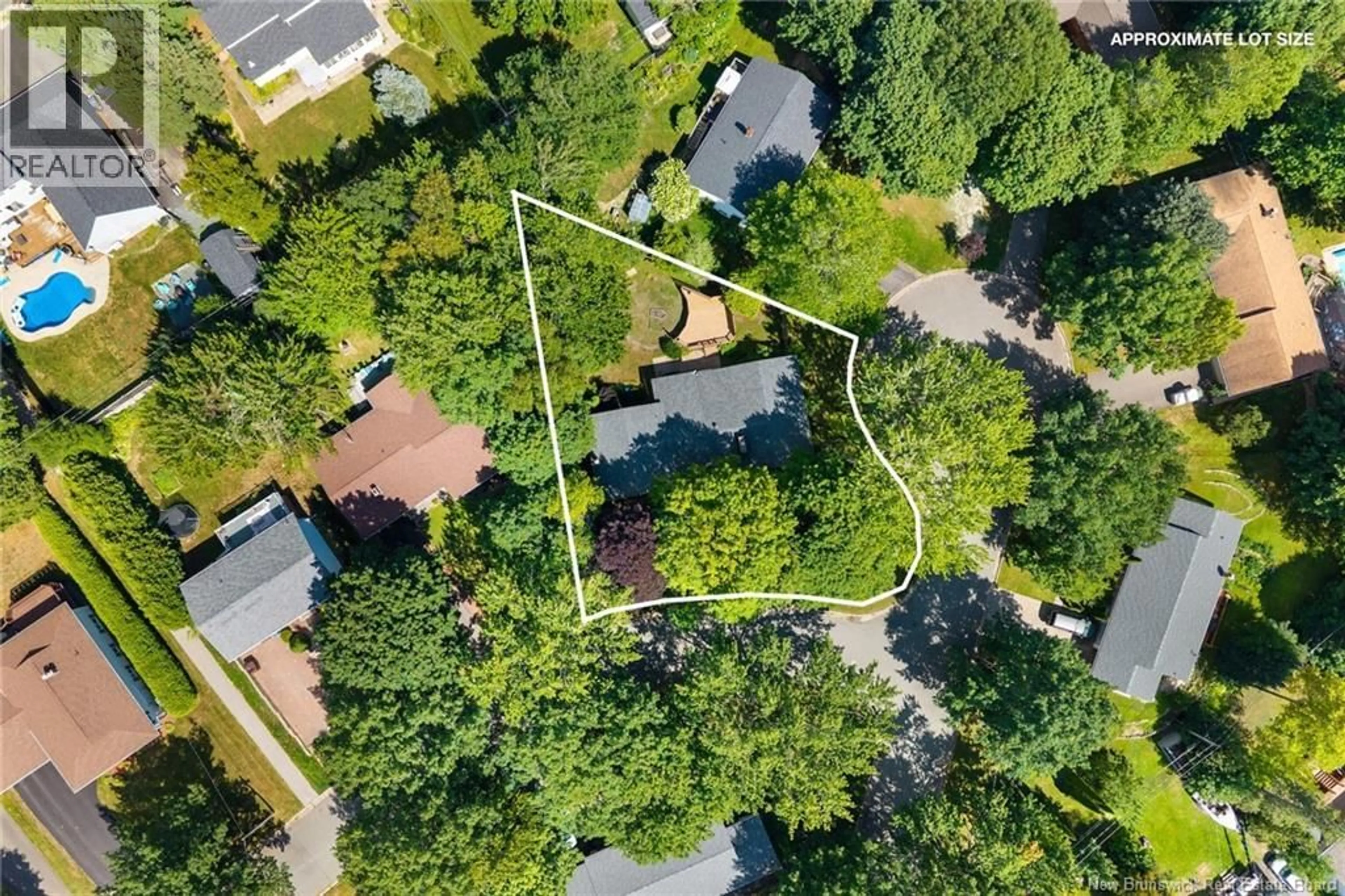 A pic from outside/outdoor area/front of a property/back of a property/a pic from drone, forest/trees view for 4 MULBERRY COURT, Fredericton New Brunswick E3A5J1