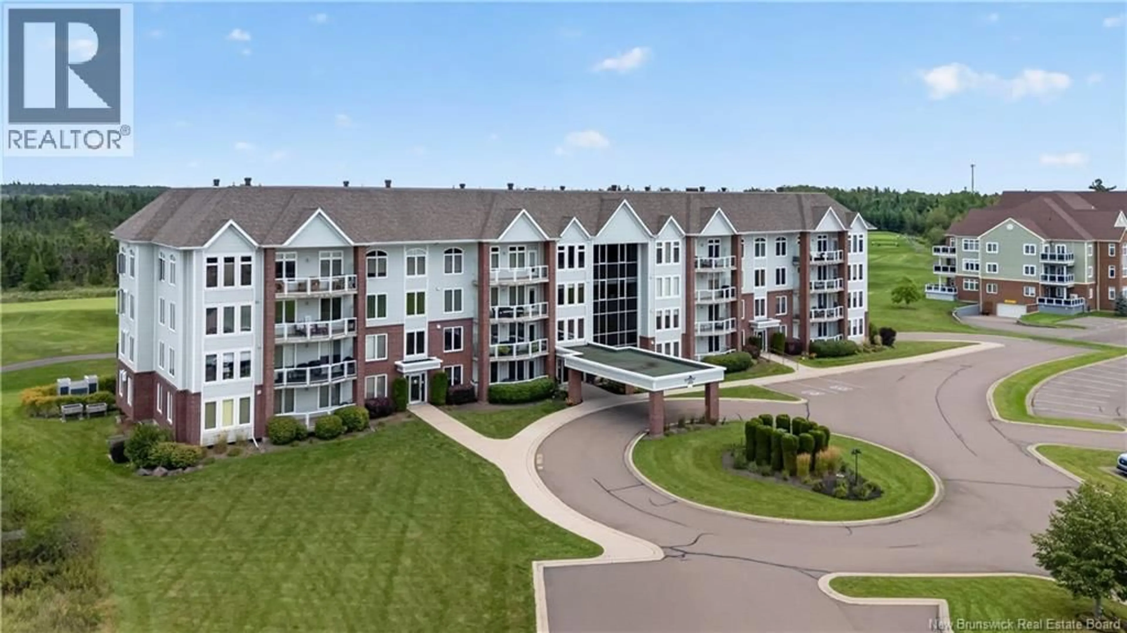 A pic from outside/outdoor area/front of a property/back of a property/a pic from drone, building for 103 - 185 ROYAL OAKS BOULEVARD, Moncton New Brunswick E1H2P7