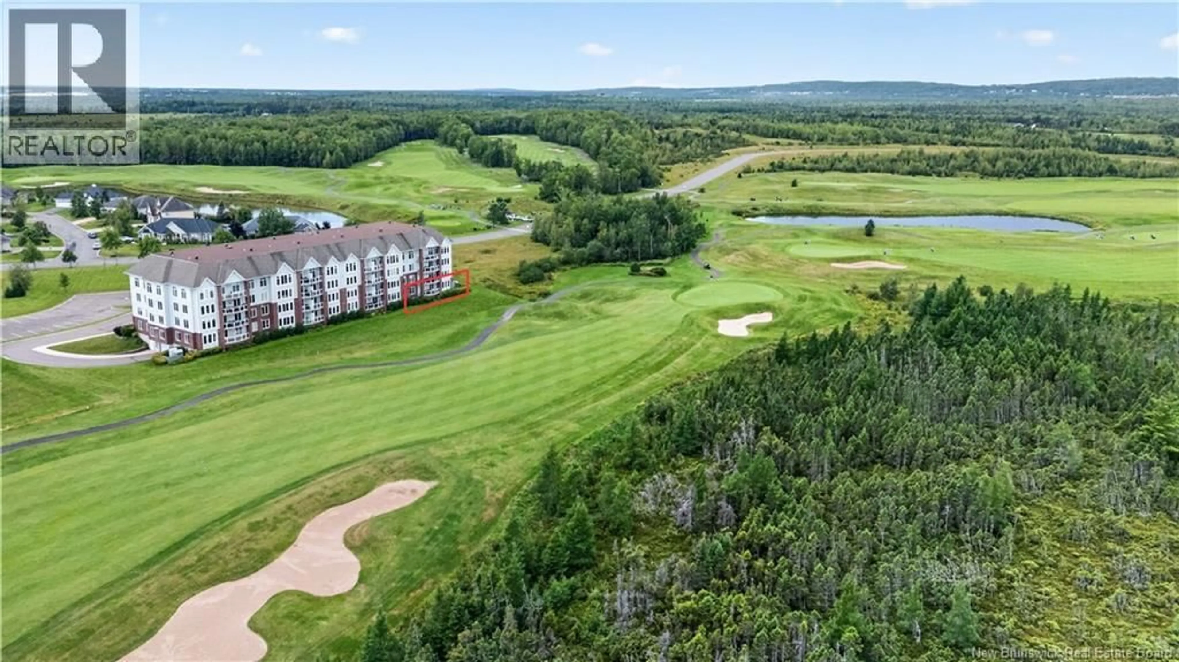 A pic from outside/outdoor area/front of a property/back of a property/a pic from drone, water/lake/river/ocean view for 103 - 185 ROYAL OAKS BOULEVARD, Moncton New Brunswick E1H2P7