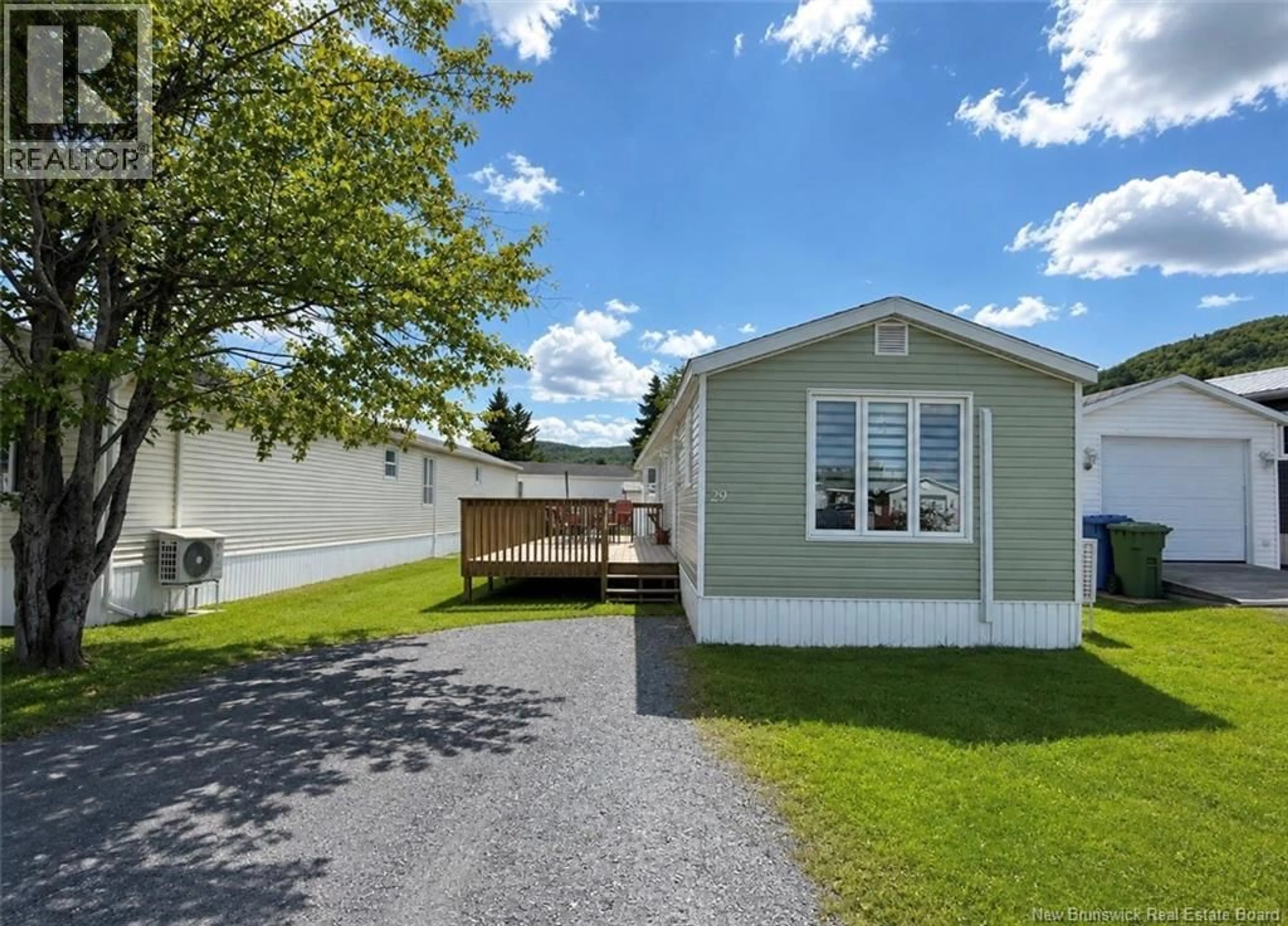 Home with vinyl exterior material, street for 29 PARC P'TISO STREET, Edmundston New Brunswick E3V3X7