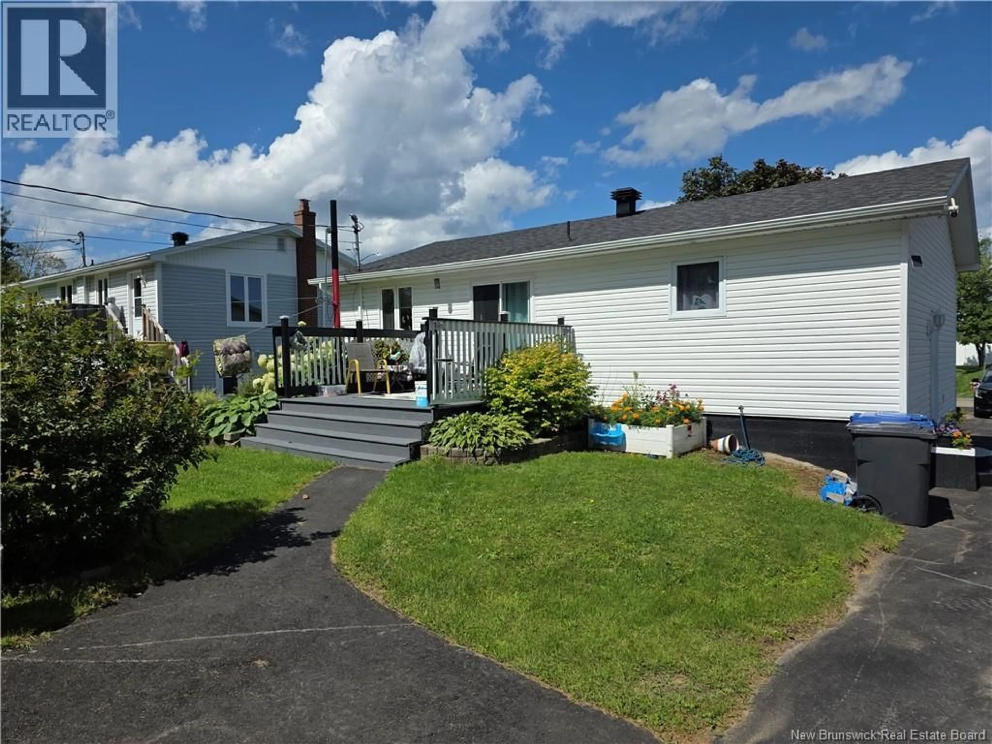A pic from outside/outdoor area/front of a property/back of a property/a pic from drone, unknown for 205 FRANCINE, Beresford New Brunswick E8K1N7