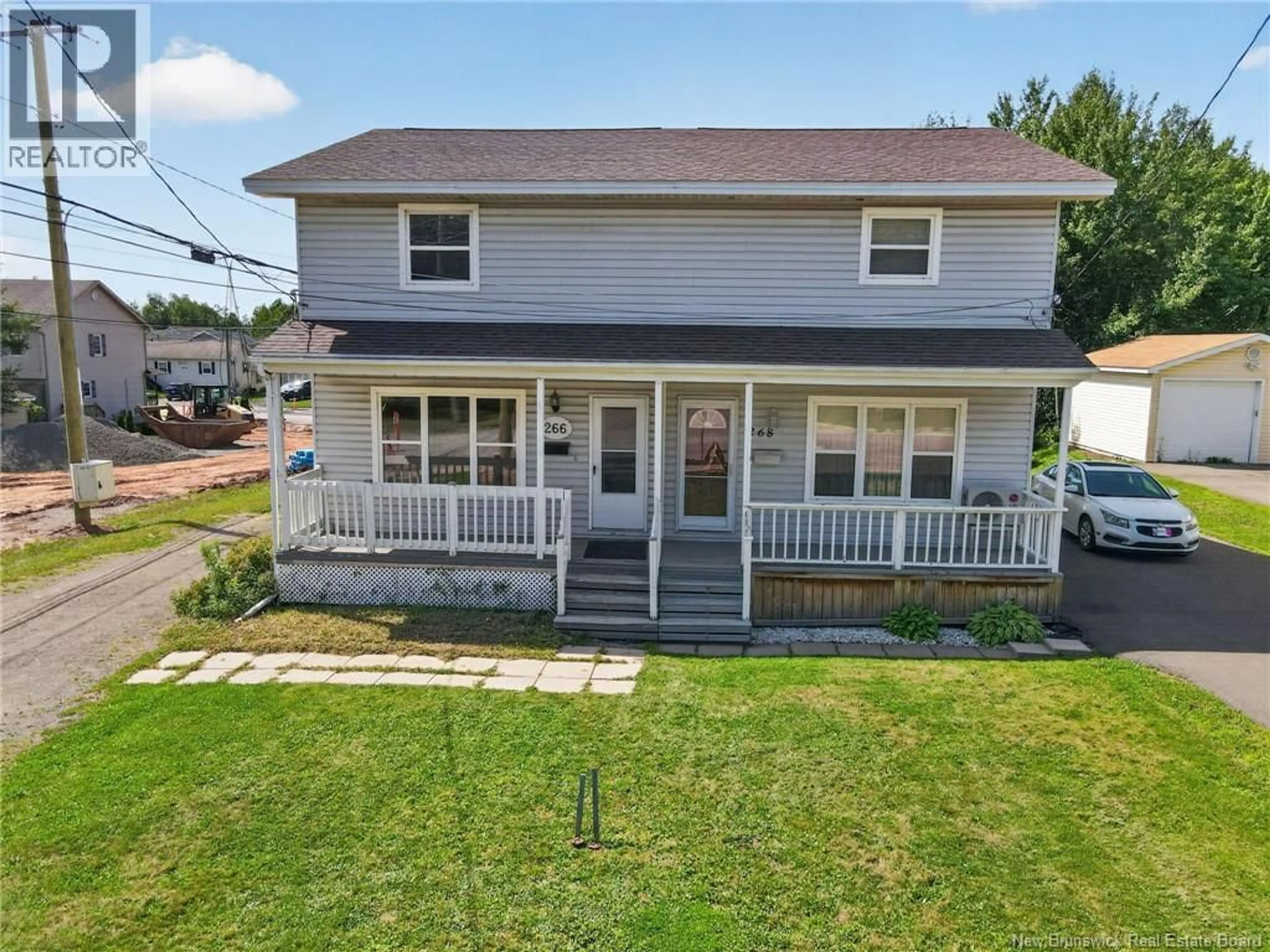 A pic from outside/outdoor area/front of a property/back of a property/a pic from drone, street for 266 POMMIERS STREET, Dieppe New Brunswick E1A2C2