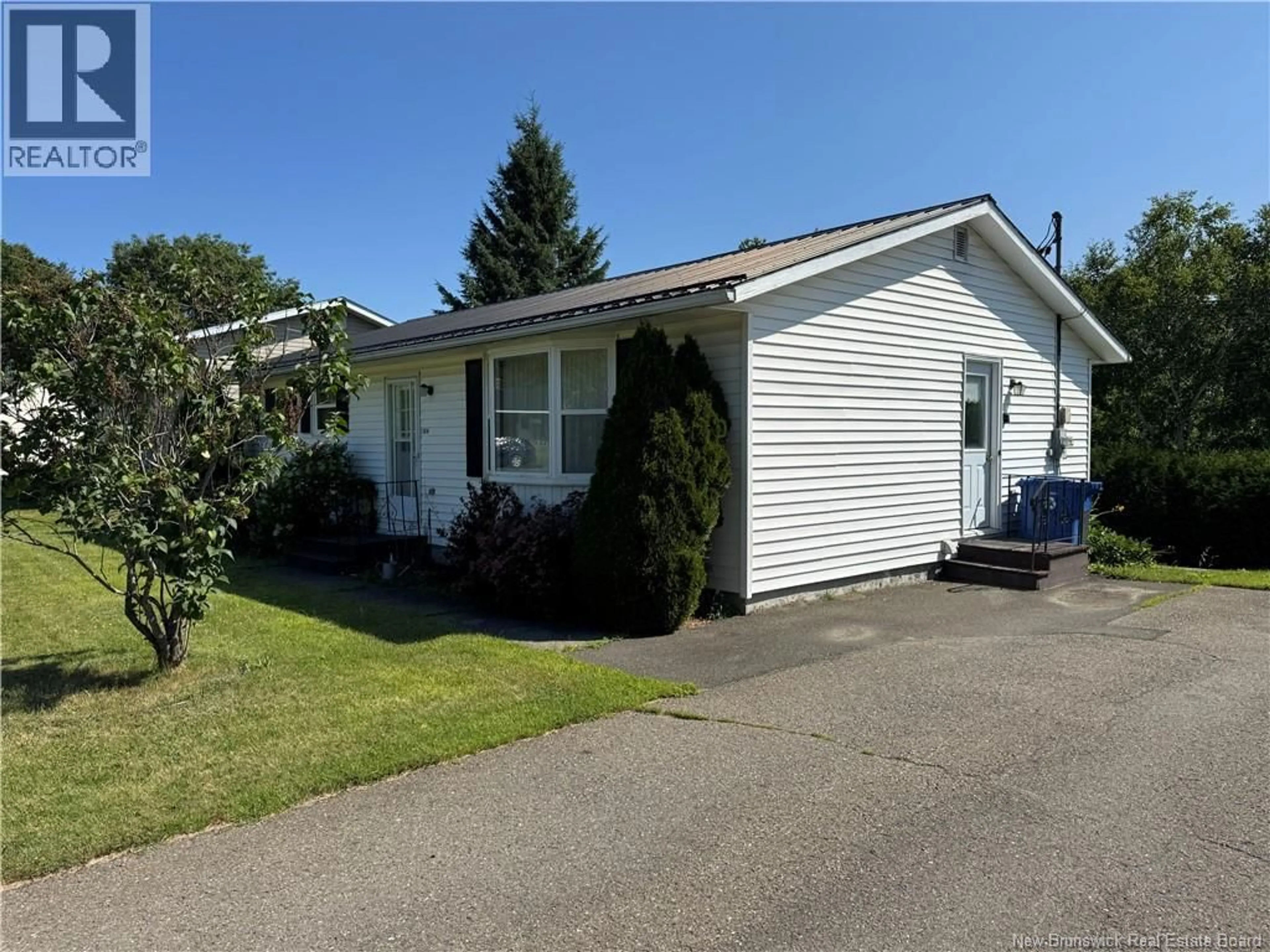 Home with vinyl exterior material, street for 104 MANOR COURT, Woodstock New Brunswick E7M2H2