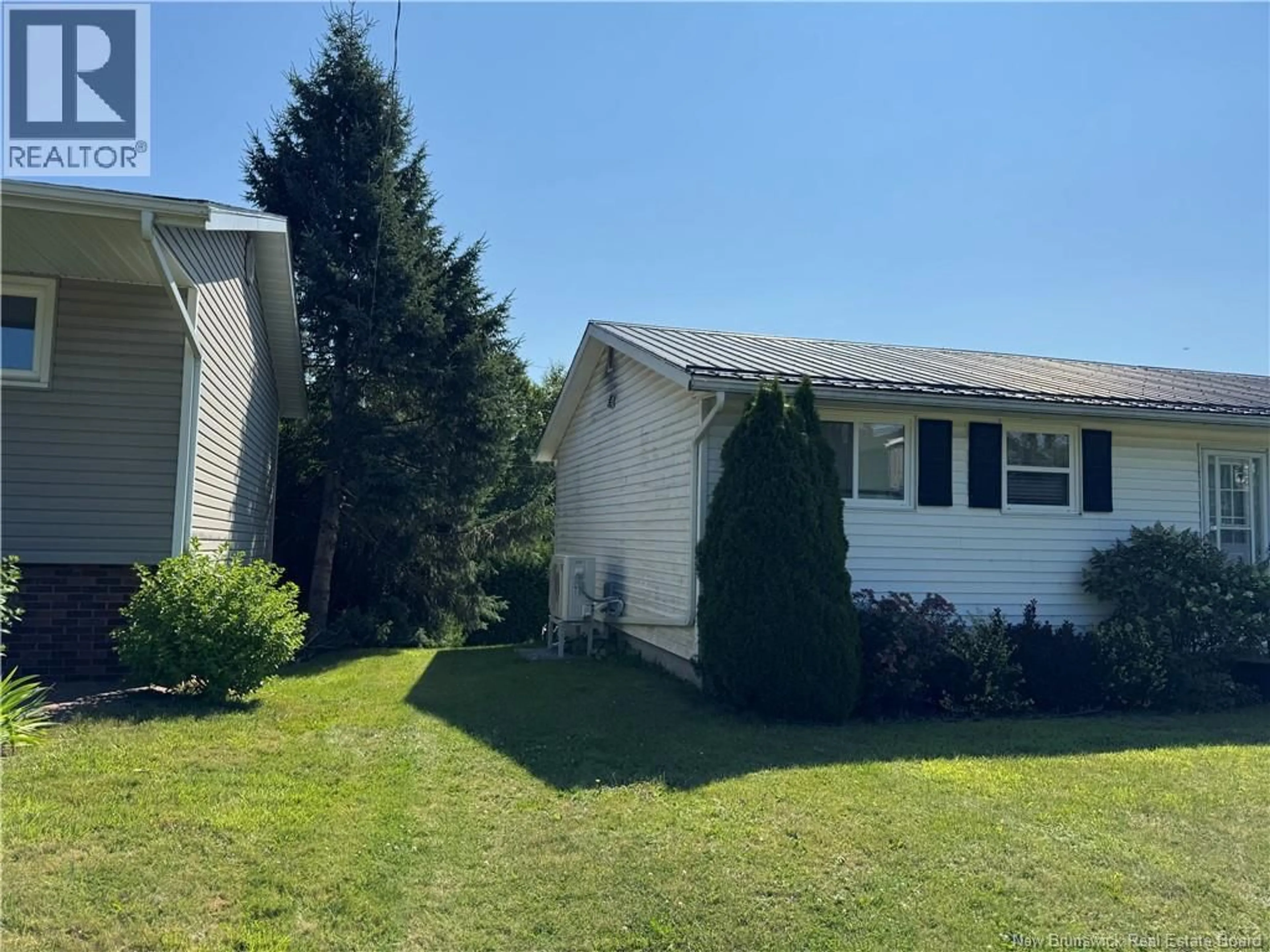 Home with vinyl exterior material, unknown for 104 MANOR COURT, Woodstock New Brunswick E7M2H2
