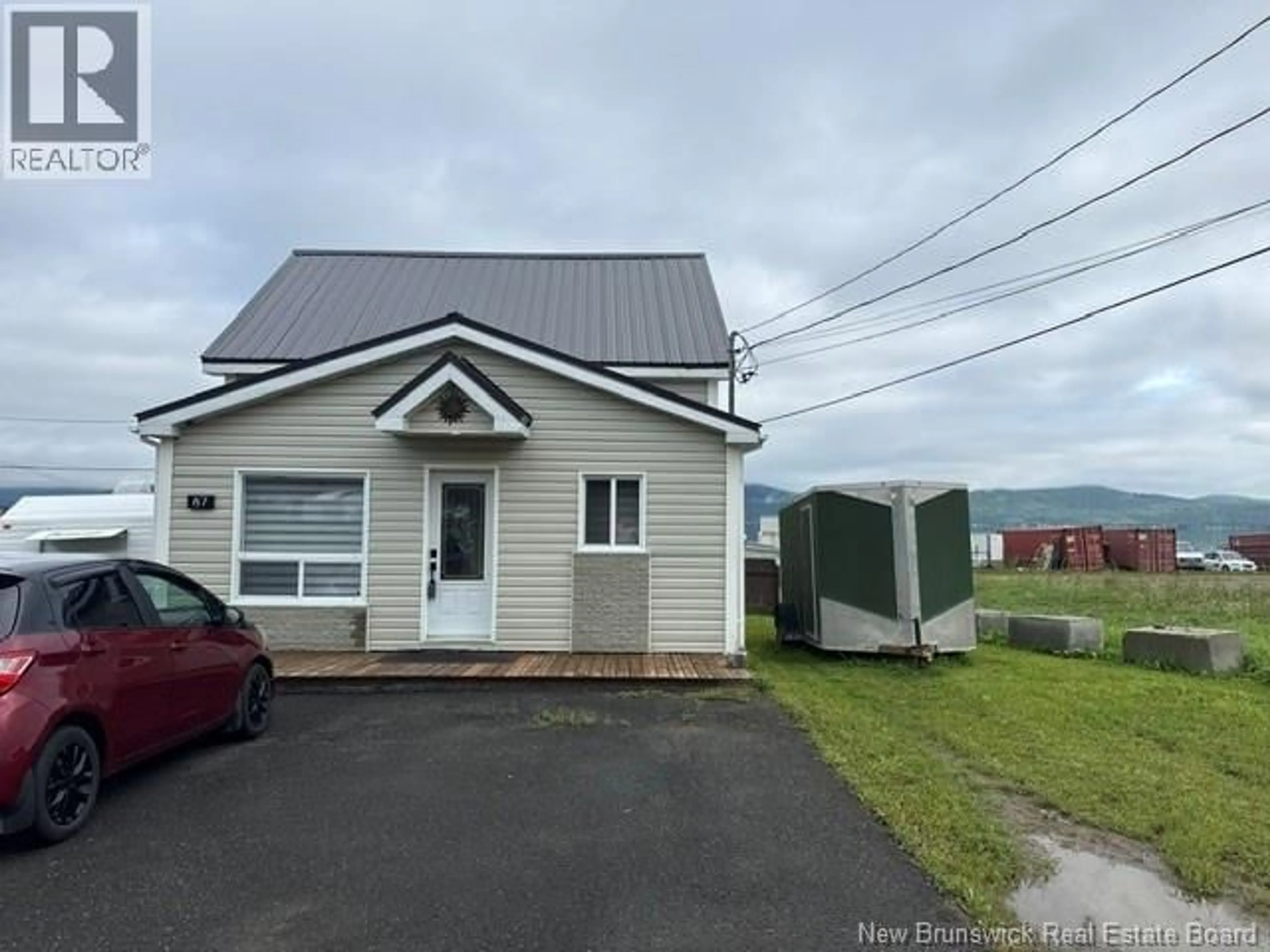 A pic from outside/outdoor area/front of a property/back of a property/a pic from drone, street for 87 VANIER STREET, Campbellton New Brunswick E3N1T8