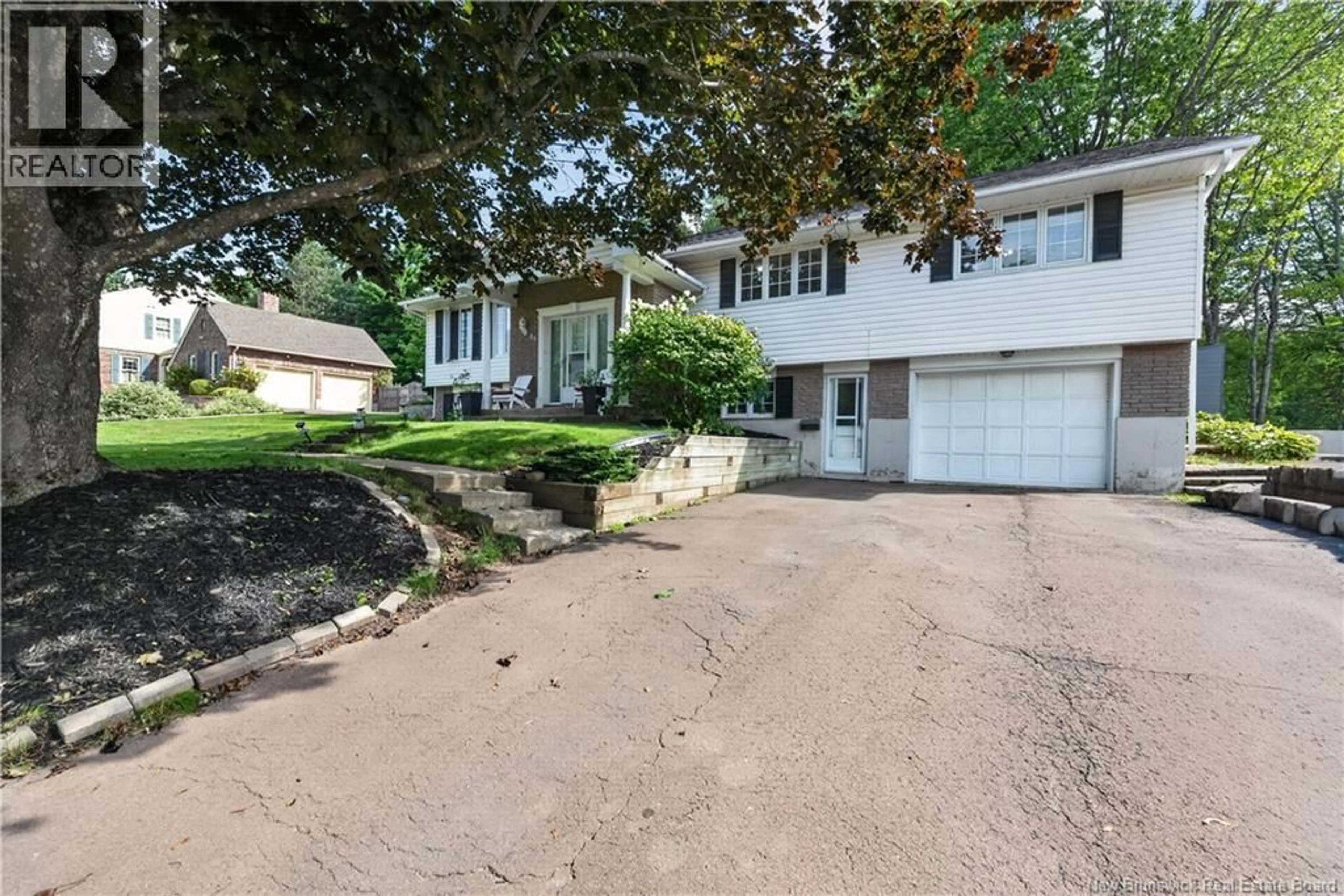 A pic from outside/outdoor area/front of a property/back of a property/a pic from drone, street for 56 FAIRWAY BOULEVARD, Riverview New Brunswick E1B1T3
