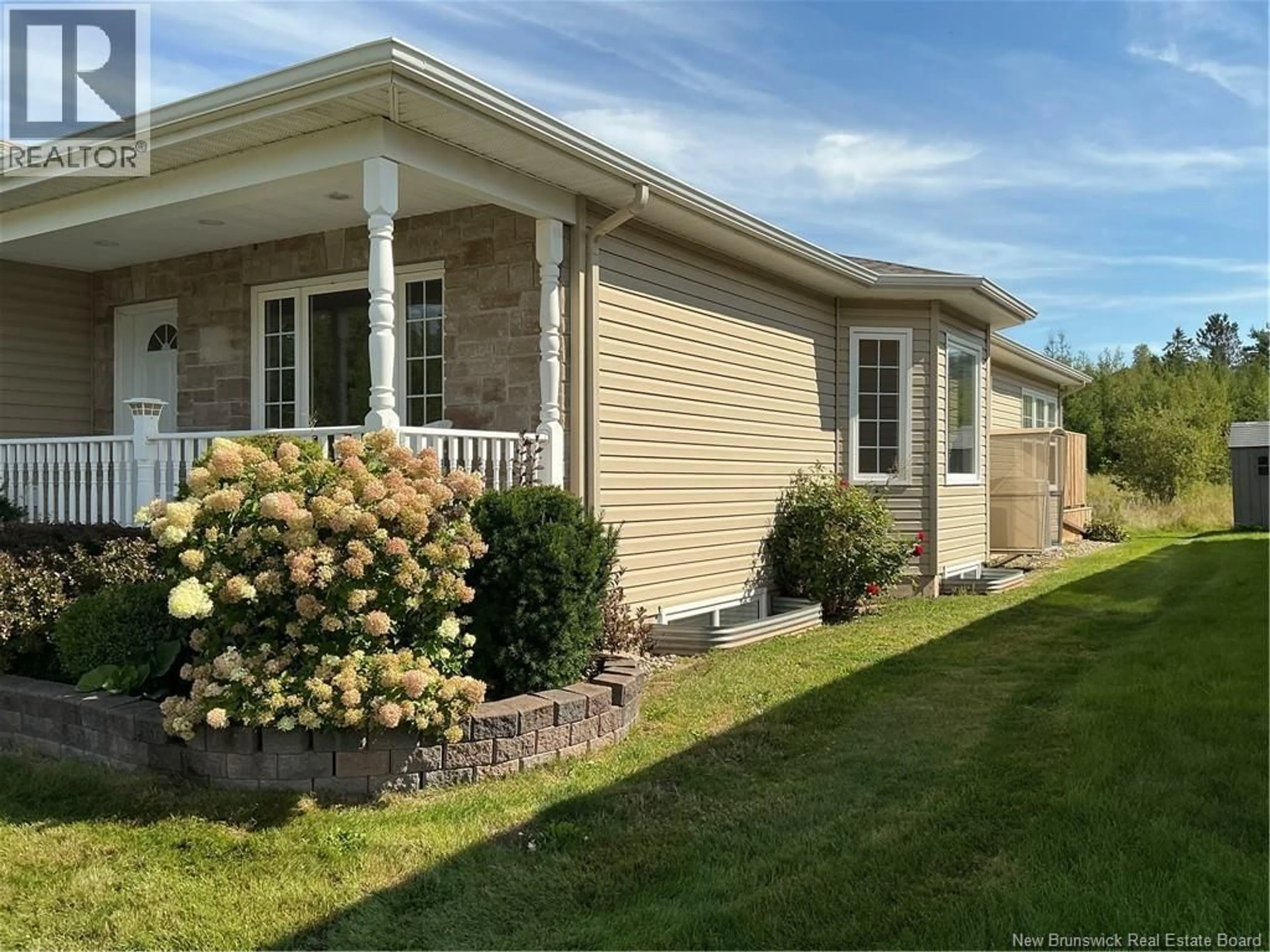 Home with vinyl exterior material, street for 125 MONARCH ROAD, Riverview New Brunswick E1B5V1