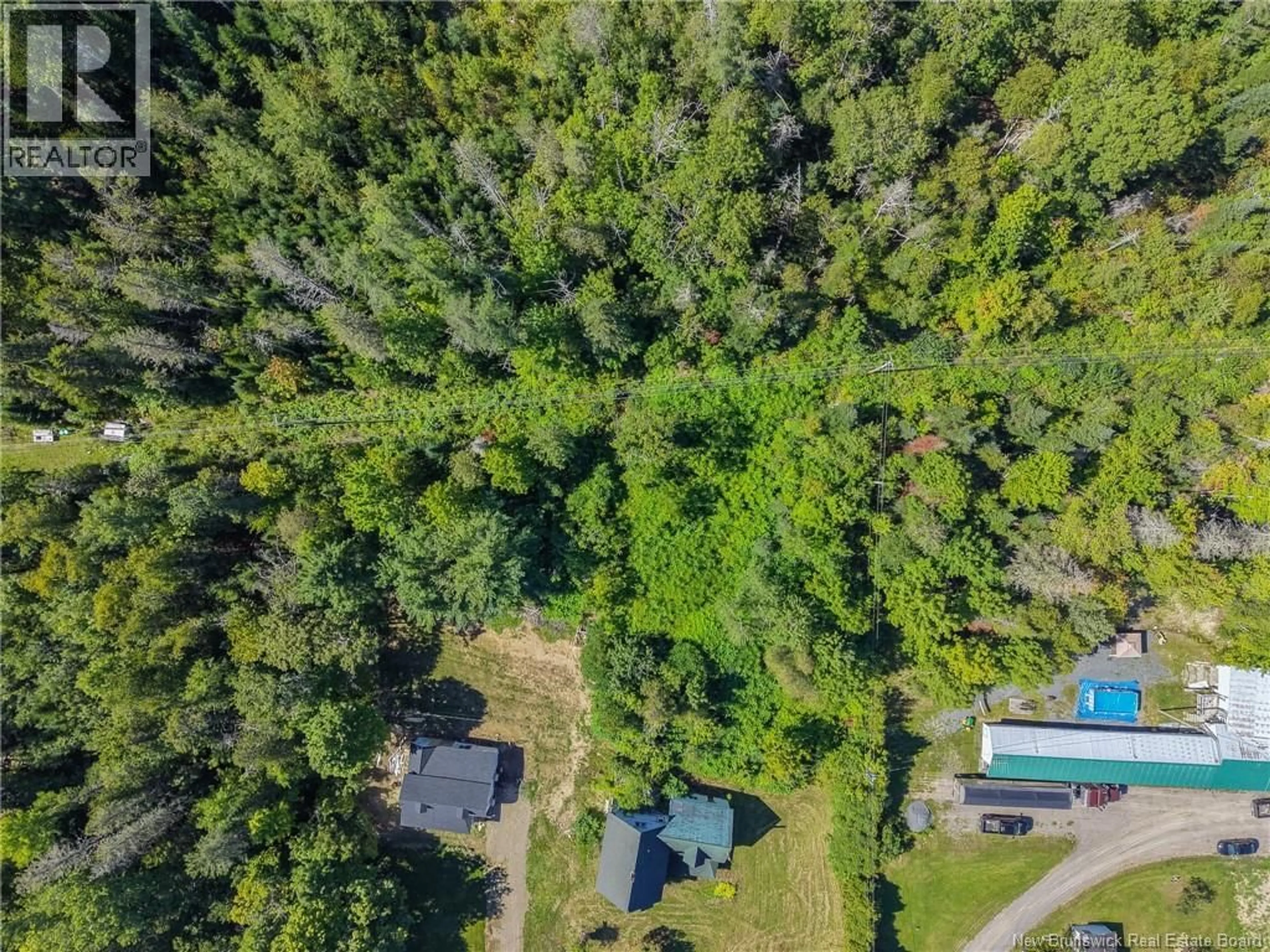 A pic from outside/outdoor area/front of a property/back of a property/a pic from drone, forest/trees view for 7186 ROUTE 102, Dumfries New Brunswick E6G1P7