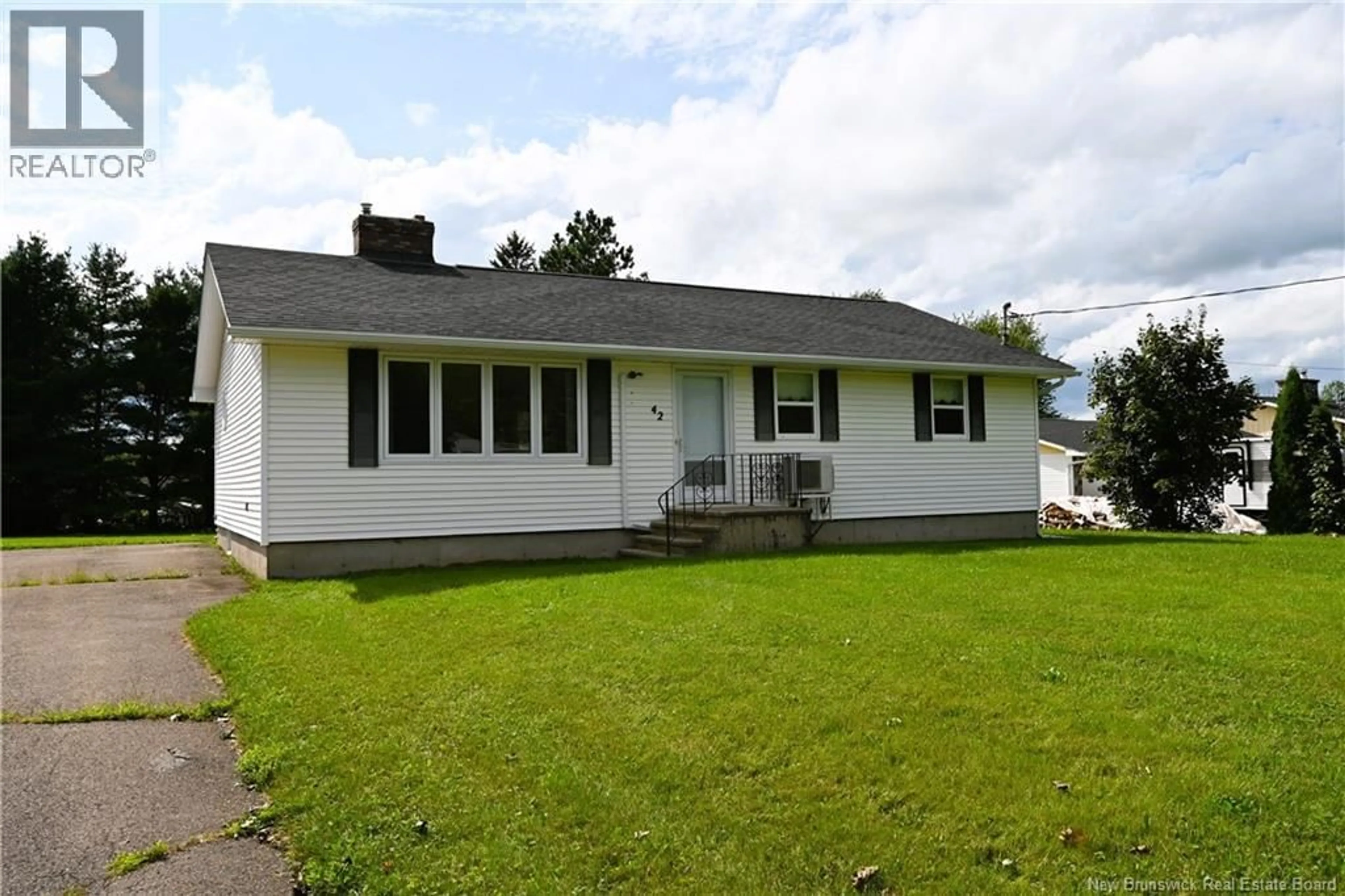Home with vinyl exterior material, street for 42 RUE YVON, Saint-Antoine New Brunswick E4V1L1