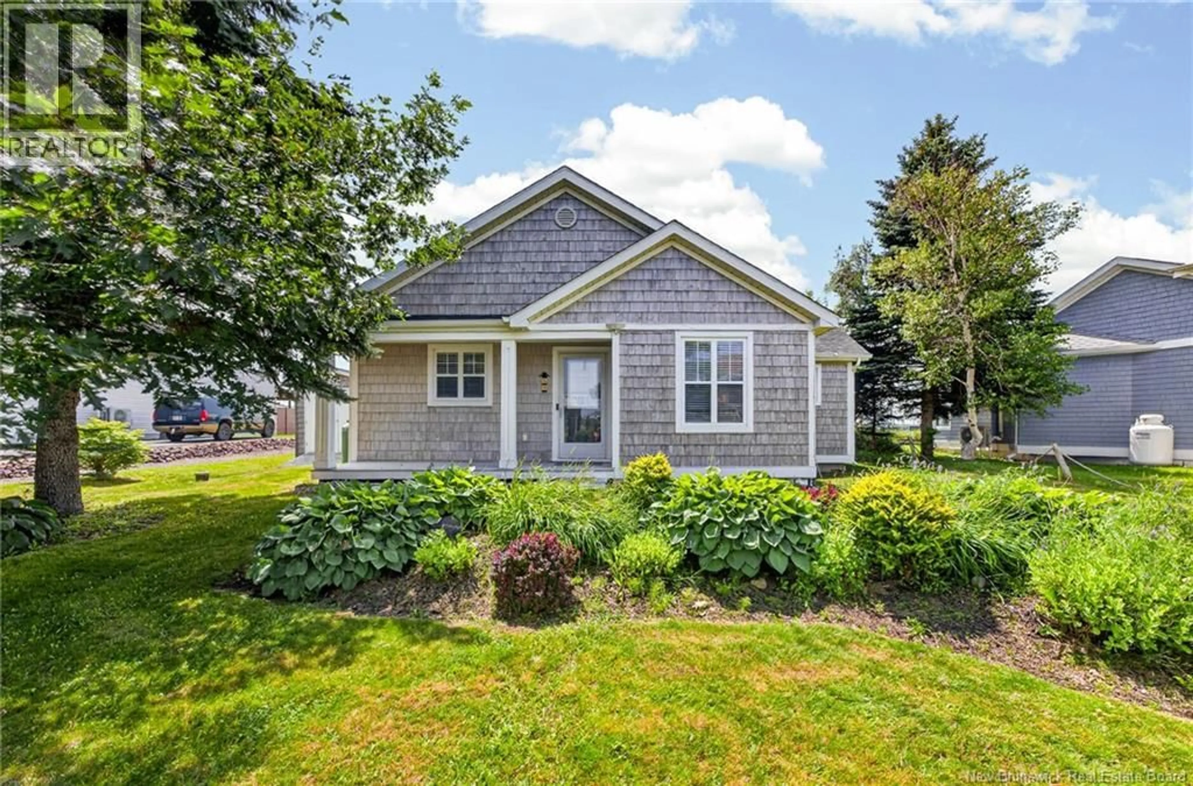 Home with vinyl exterior material, street for 54 ACADIE STREET, Cocagne New Brunswick E4R5Y6