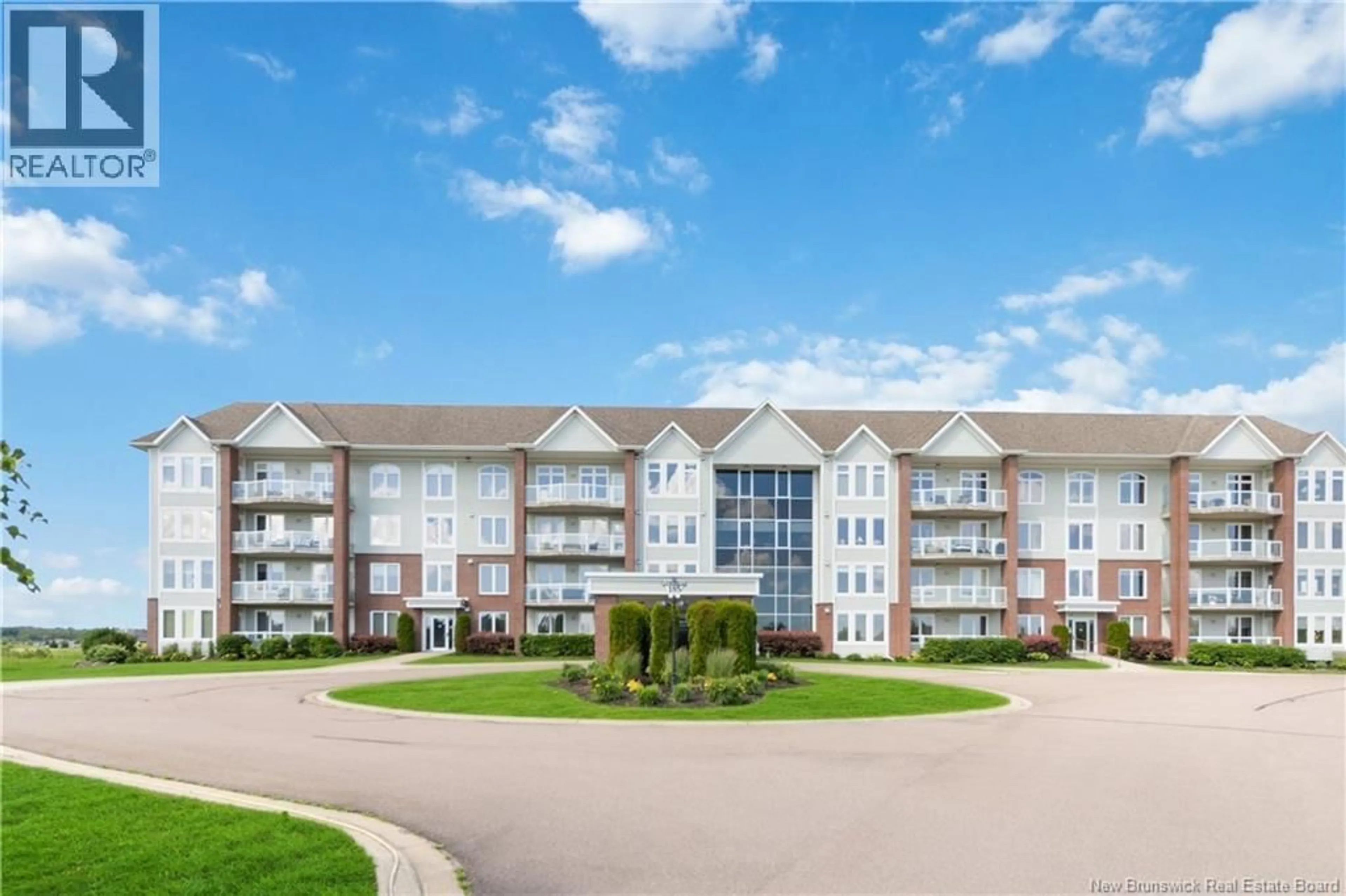 A pic from outside/outdoor area/front of a property/back of a property/a pic from drone, unknown for 208 - 185 ROYAL OAKS BOULEVARD, Moncton New Brunswick E1H2P7