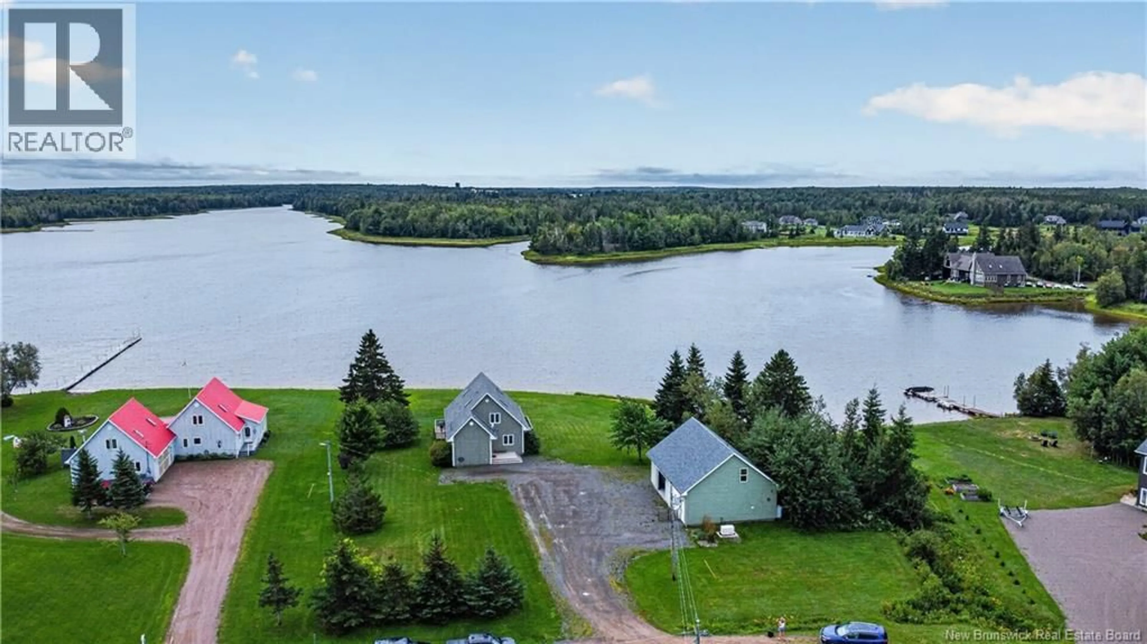 A pic from outside/outdoor area/front of a property/back of a property/a pic from drone, water/lake/river/ocean view for 53 CHEMIN DE LA RIVIERE, Grand-Barachois New Brunswick E4P7E4