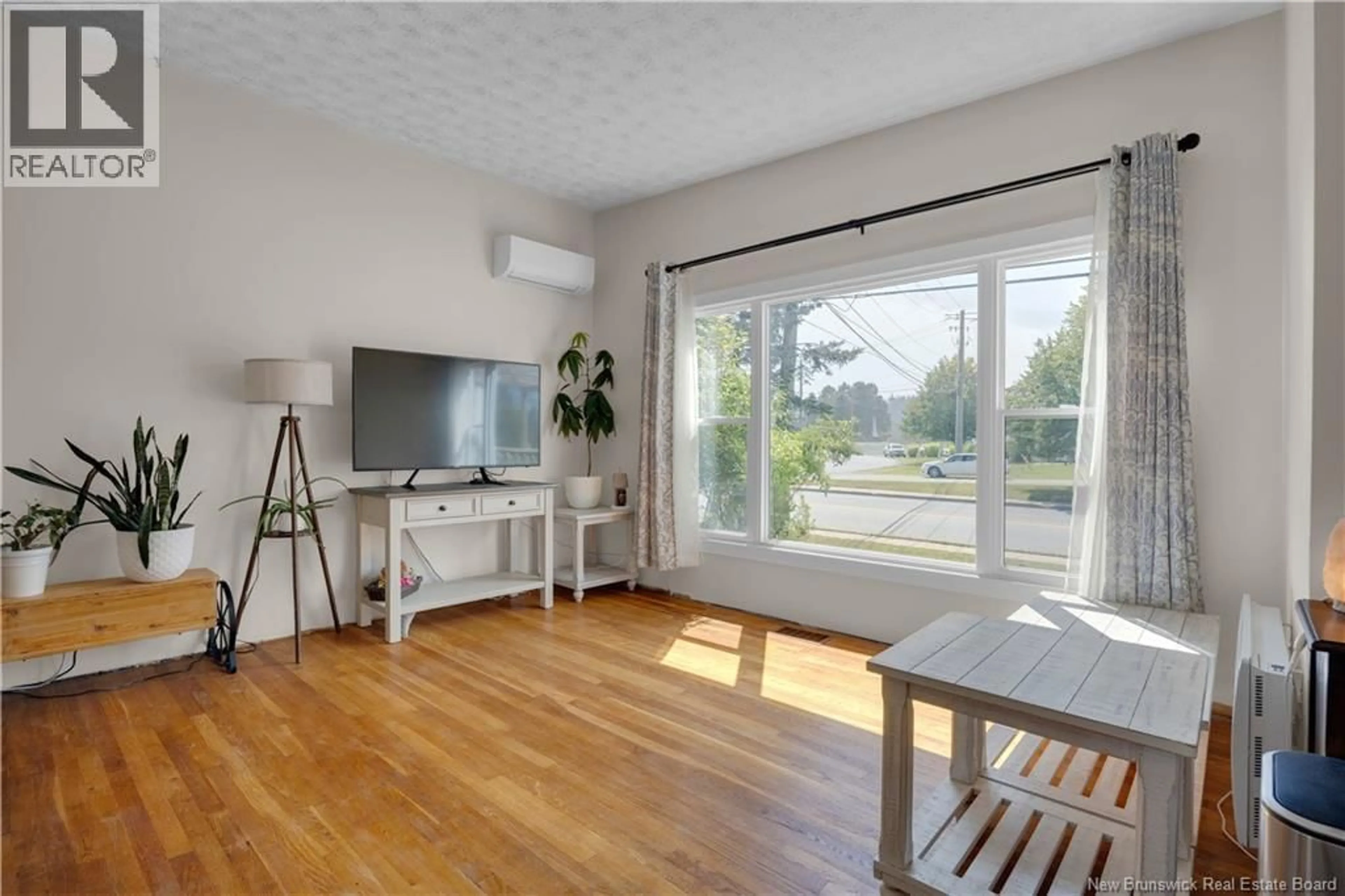 Living room with furniture, wood/laminate floor for 96 WOODWARD AVENUE, Saint John New Brunswick E2K1Z8
